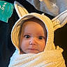baby, towel, bunny_ears, wrapped, infant, face, blue_eyes, soft_texture, cute, child, blanket, cozy, portrait, indoors, expression, head, cute_costume, warm, snug, newborn