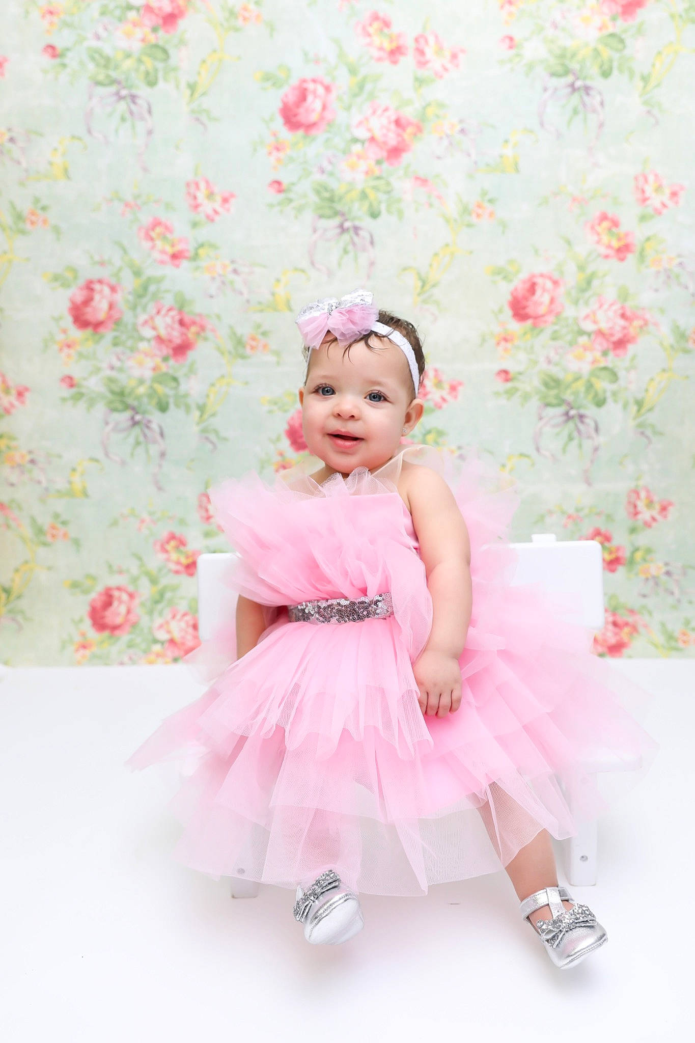 Amelia joined the competition — help win amazing prizes! baby_toddler_clothing, day_dress, embellishment, fashion_accessory, flower, happy, headwear, joy, magenta, one_piece_garment, pattern, peach, person, petal, pink, plant, product, ruffle, shoe, sleeve