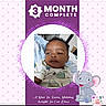 baby, infant, blanket, clothing, face, portrait, smile, cute, newborn, child, polka_dot, purple, illustration, elephant, cartoon, text_overlay, celebration, diaper_package, soft_texture, indoor