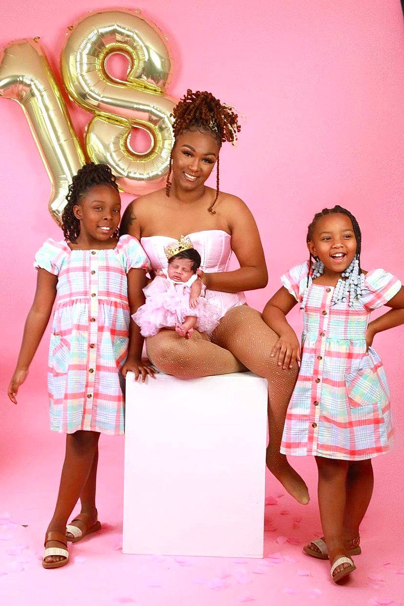 Ke'Moria is registered to the contest to win money with this photo: beauty, child, dress, event, facial_expression, fashion, fashion_design, fun, happy, human, joy, leisure, magenta, person, pink, purple, sandal, skin, smile, standing