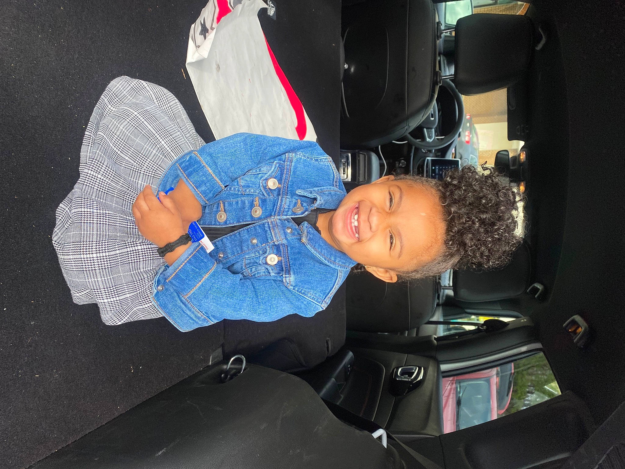 Reign is registered to the contest to win money with this photo: auto_part, automotive_design, automotive_exterior, automotive_lighting, automotive_tire, automotive_wheel_system, automotive_window_part, bumper, child, electric_blue, family_car, hood, joy, luxury_vehicle, motor_vehicle, person, toddler, trunk, vehicle, vehicle_door