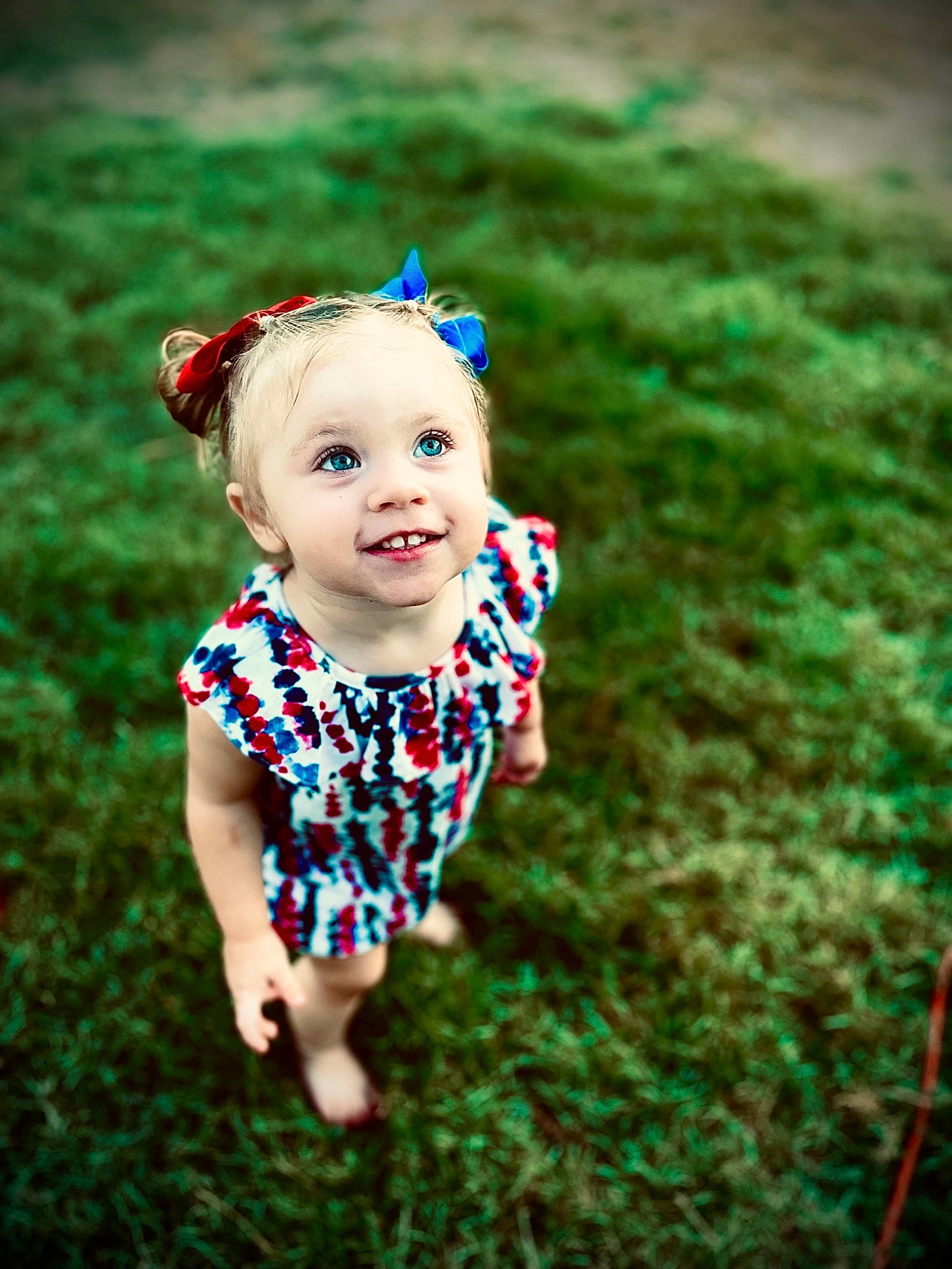 Kynlee joined the competition — help win amazing prizes! baby, baby_toddler_clothing, child, dress, eye, face, flash_photography, flower, grass, green, happy, joy, leisure, natural_environment, pattern, people_in_nature, person, plant, skin, smile