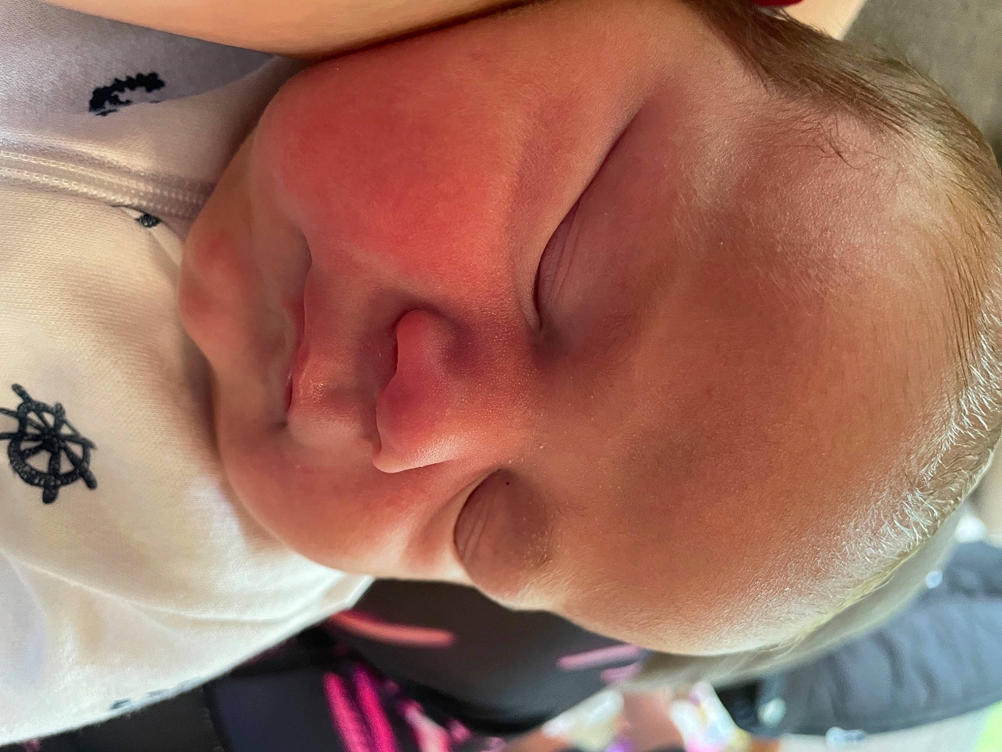 Levi is registered to the contest to win money with this photo: baby, cheek, chest, child, close_up, comfort, ear, eyebrow, eyelash, forehead, gesture, happy, jaw, lip, mouth, nail, neck, nose, person, skin