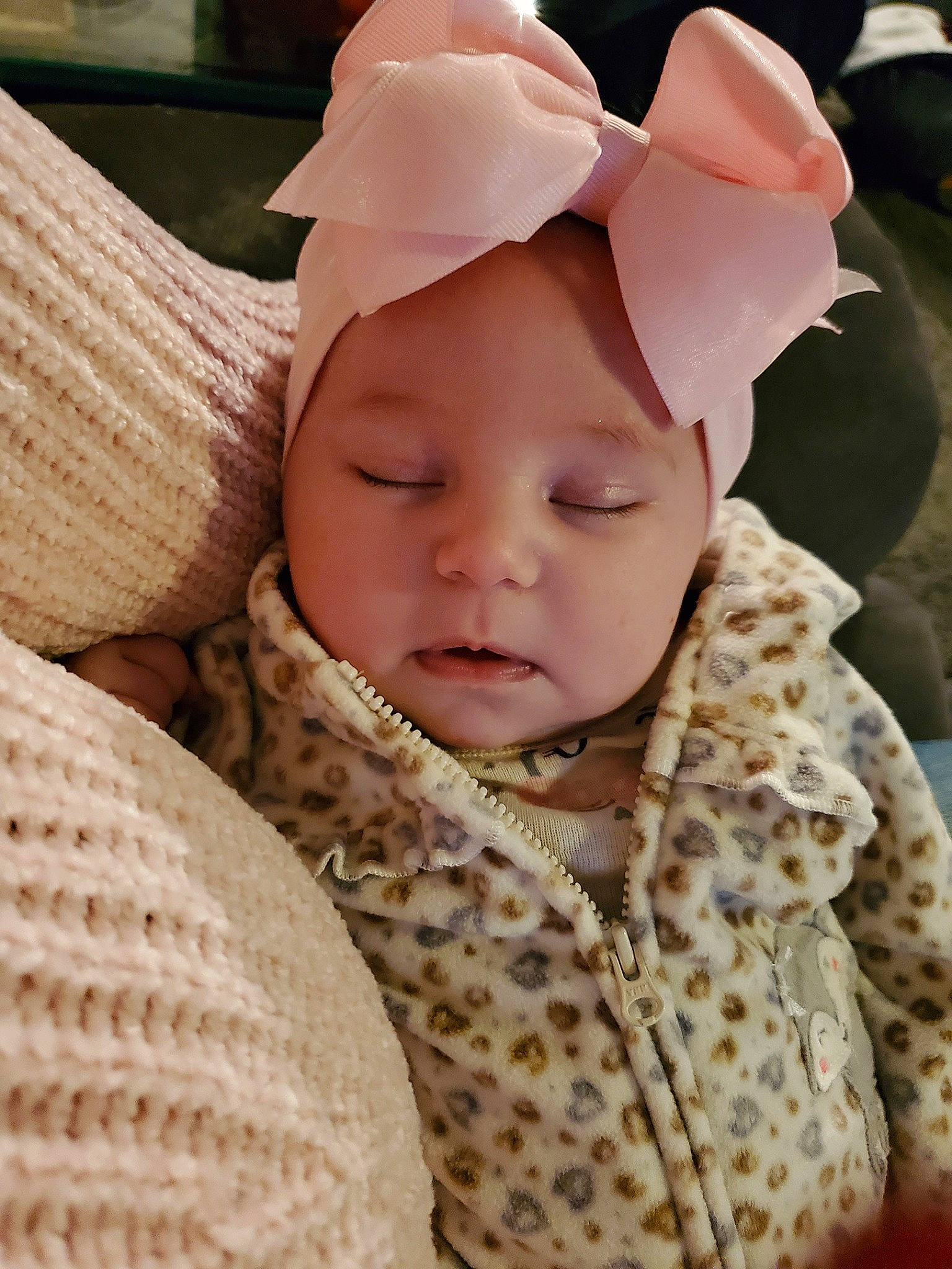 Emberlee is registered to the contest to win money with this photo: baby, bonnet, cheek, child, ear, face, hat, head, headgear, headwear, person, skin, toddler, wool