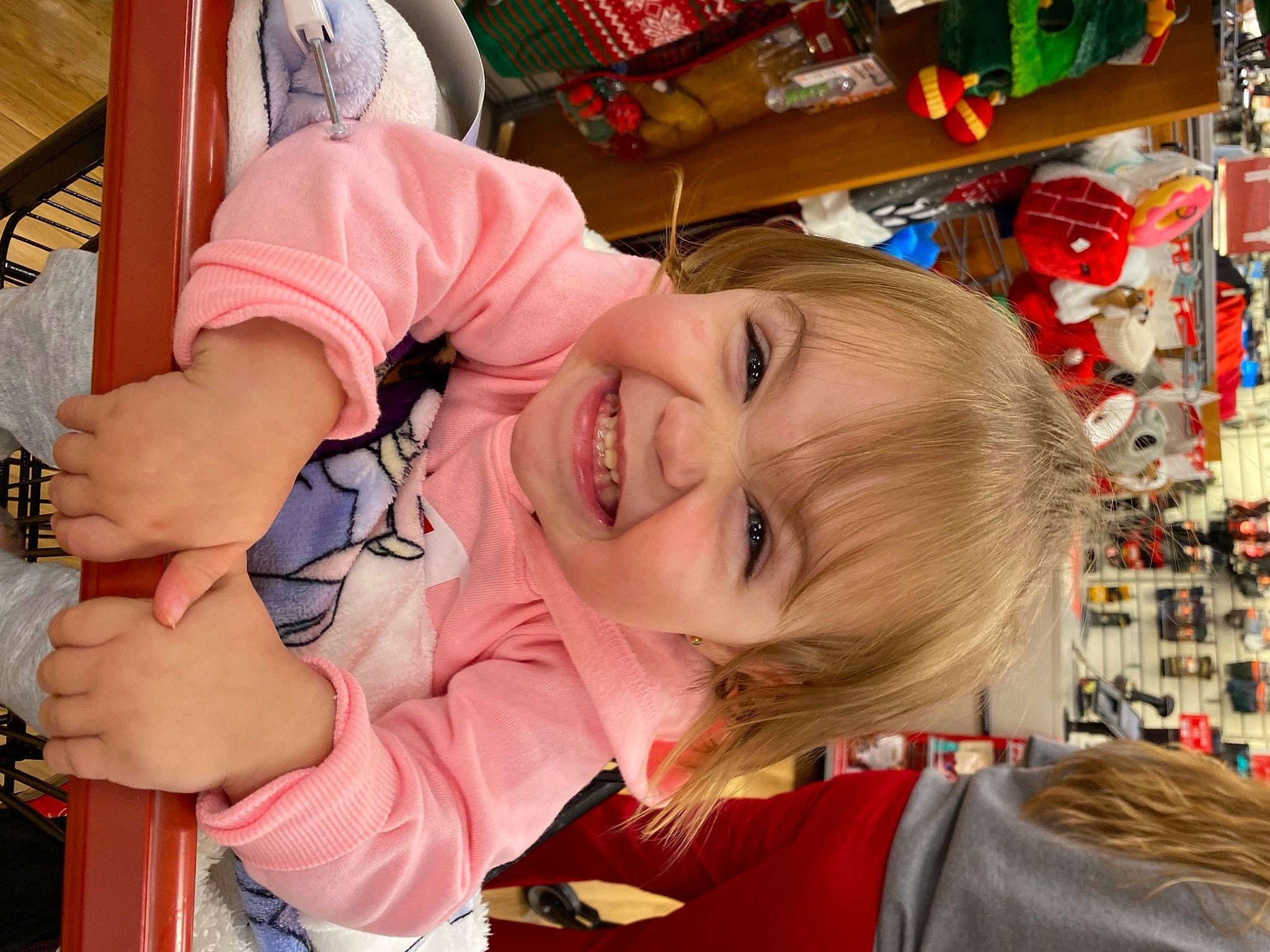 Sophia joined the competition — help win amazing prizes! baby, baby_toddler_clothing, basket, bracelet, brown_hair, child, ear, holiday, joy, laugh, marketplace, mouth, ornament, person, retail, shelf, smile, toddler, tooth