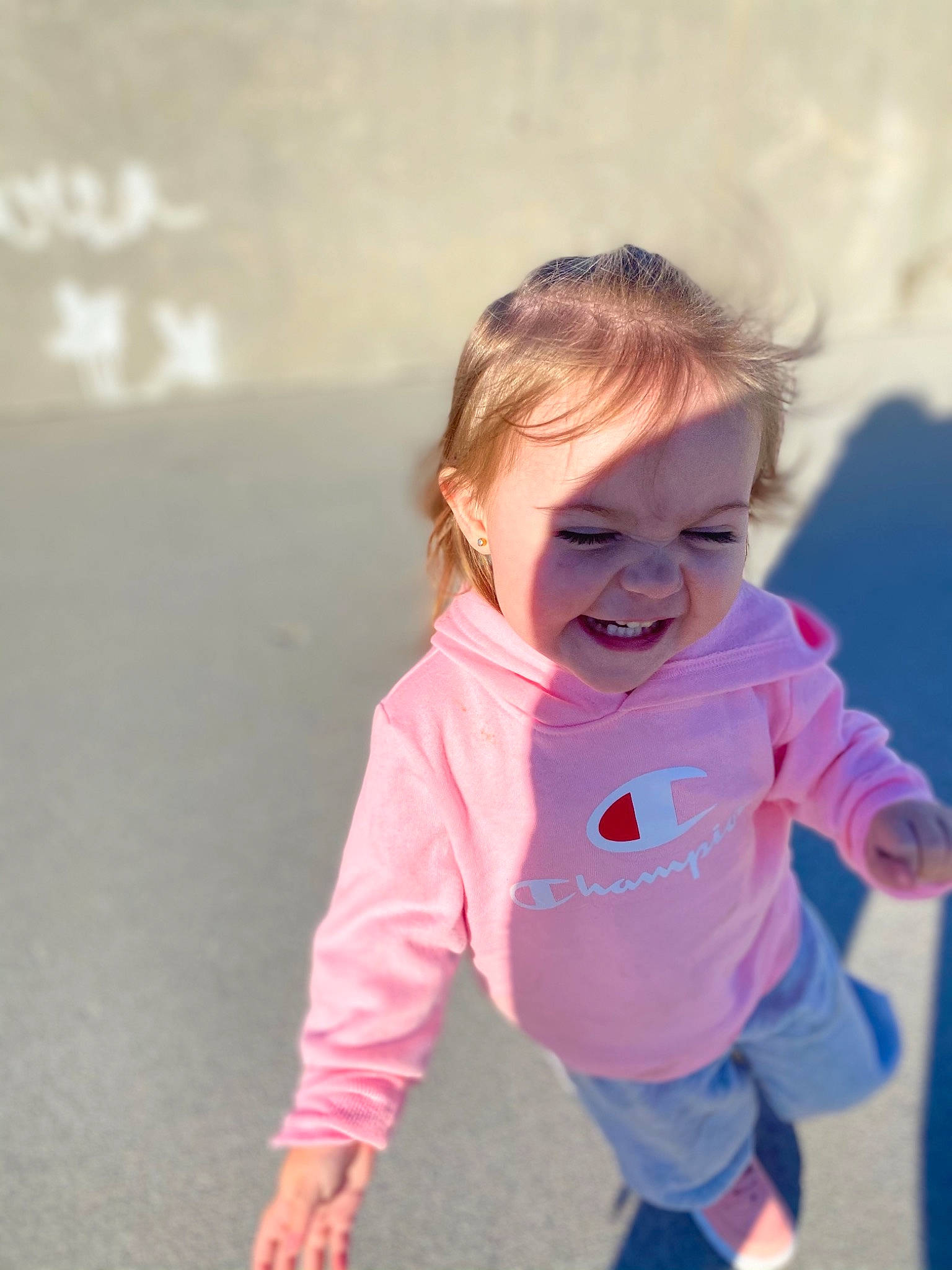 Sophia is registered to the contest to win money with this photo: baby, baby_toddler_clothing, beauty, cheek, child, facial_expression, gesture, happy, joy, laugh, mouth, organ, person, pink, sleeve, toddler, tongue