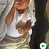 Demi is registered to the contest to win money with this photo: baby, blanket, communication, cozy, cute, digital_interface, floral_pattern, hand, headband, indoor, infant, newborn, person, phone_screen, resting, sleeping, soft_fabric, technology, video_call, white_onesie
