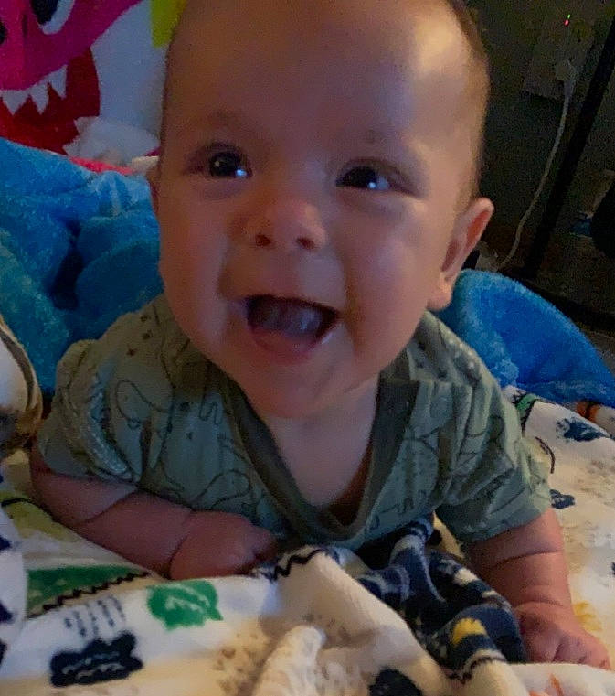 Marcus joined the competition — help win amazing prizes! baby, baby_laughing, baby_toddler_clothing, cheek, child, finger, fun, happy, iris, mammal, mouth, nose, person, sharing, sitting, skin, sleeve, smile, thumb, toddler