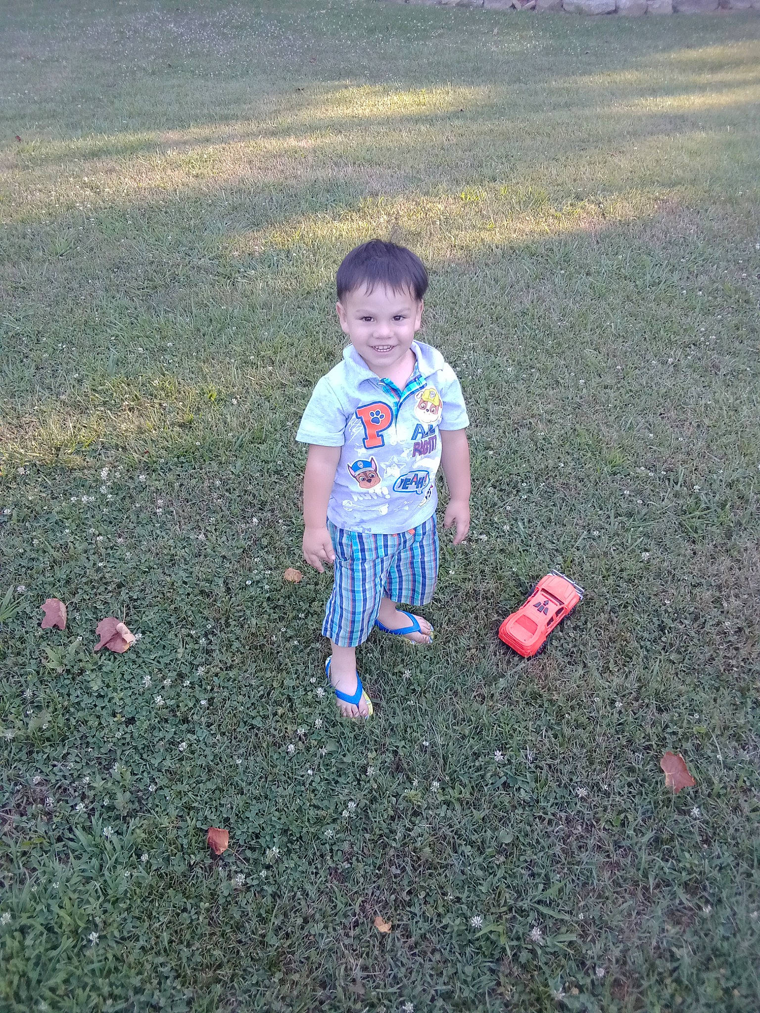 James joined the competition — help win amazing prizes! asphalt, fun, grass, grass_family, grassland, happy, joy, landscape, lawn, leaf, people_in_nature, person, plant, recreation, road_surface, sidewalk, sky, standing, sunlight, tar