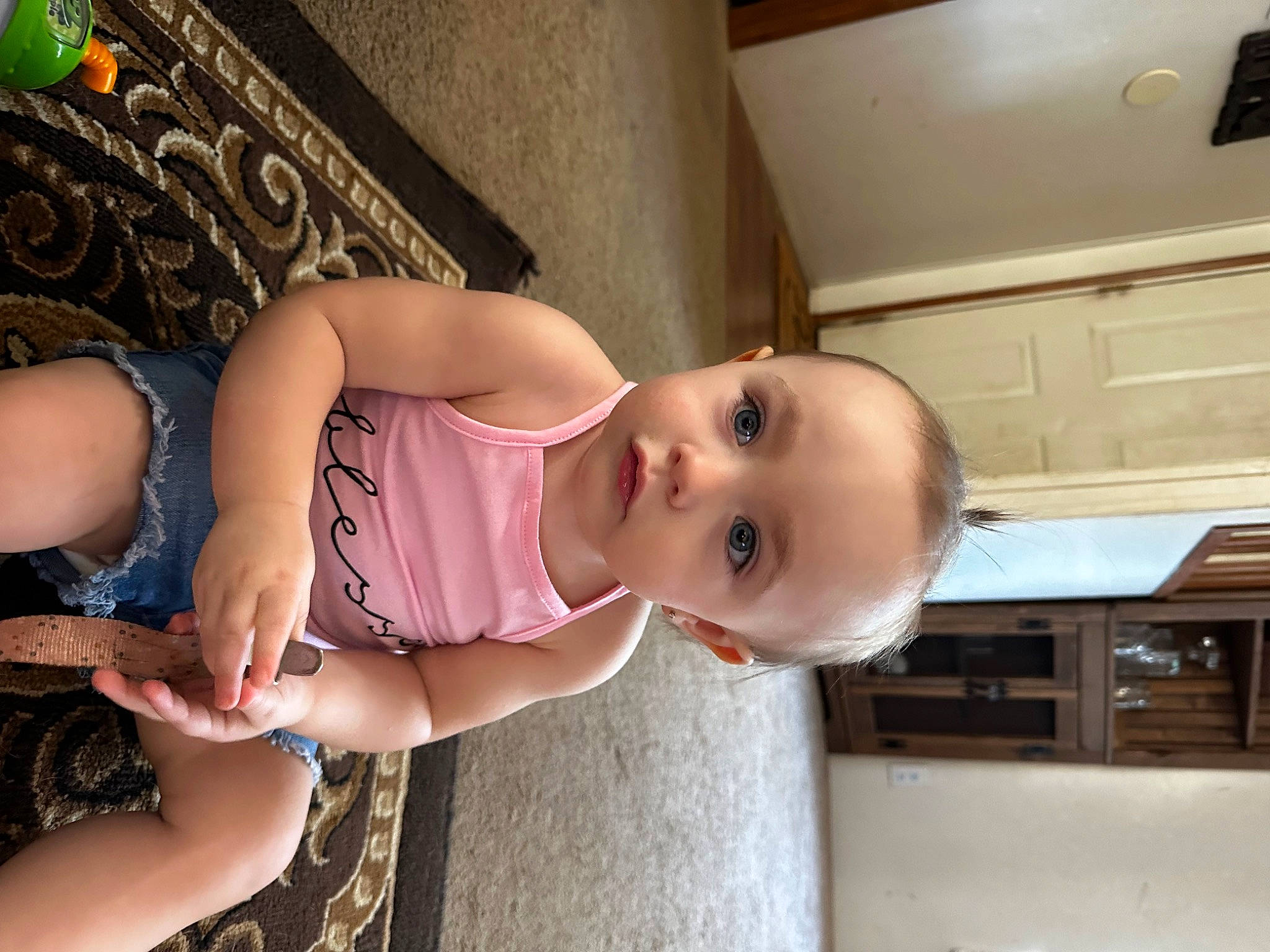 Ryleigh is registered to the contest to win money with this photo: baby, baby_toddler_clothing, cheek, chest, child, dress, eyelash, foot, fun, happy, human_leg, kitchen_appliance, lip, mouth, nose, person, room, skin, smile, thigh