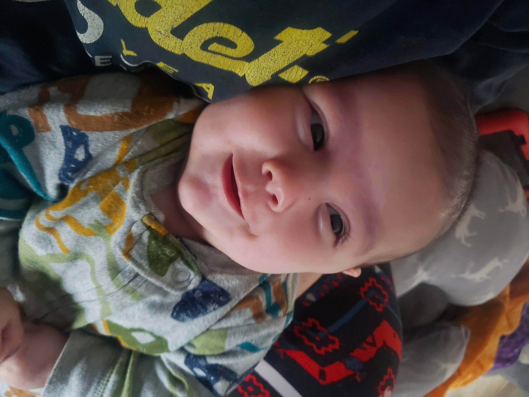 Anne is registered to the contest to win money with this photo: baby, baby_toddler_clothing, cheek, child, chin, eyebrow, face, facial_expression, happy, hat, iris, lip, mouth, nose, organ, person, product, skin, smile, toddler