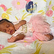 Mariyoni is registered to the contest to win money with this photo: architecture, baby, bed, bedroom, blanket, building, cushion, face, furniture, head, homedecor, indoors, newborn, person, photography, pillow, portrait, quilt, room, sleeping