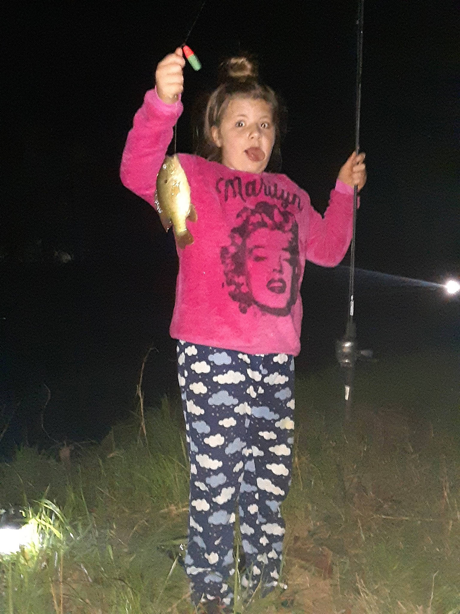 Catherine joined the competition — help win amazing prizes! child, electric_blue, entertainment, event, flash_photography, fun, gesture, grass, hand, happy, leisure, magenta, performing_arts, person, pink, recreation, sleeve, surprise, t_shirt, thumb