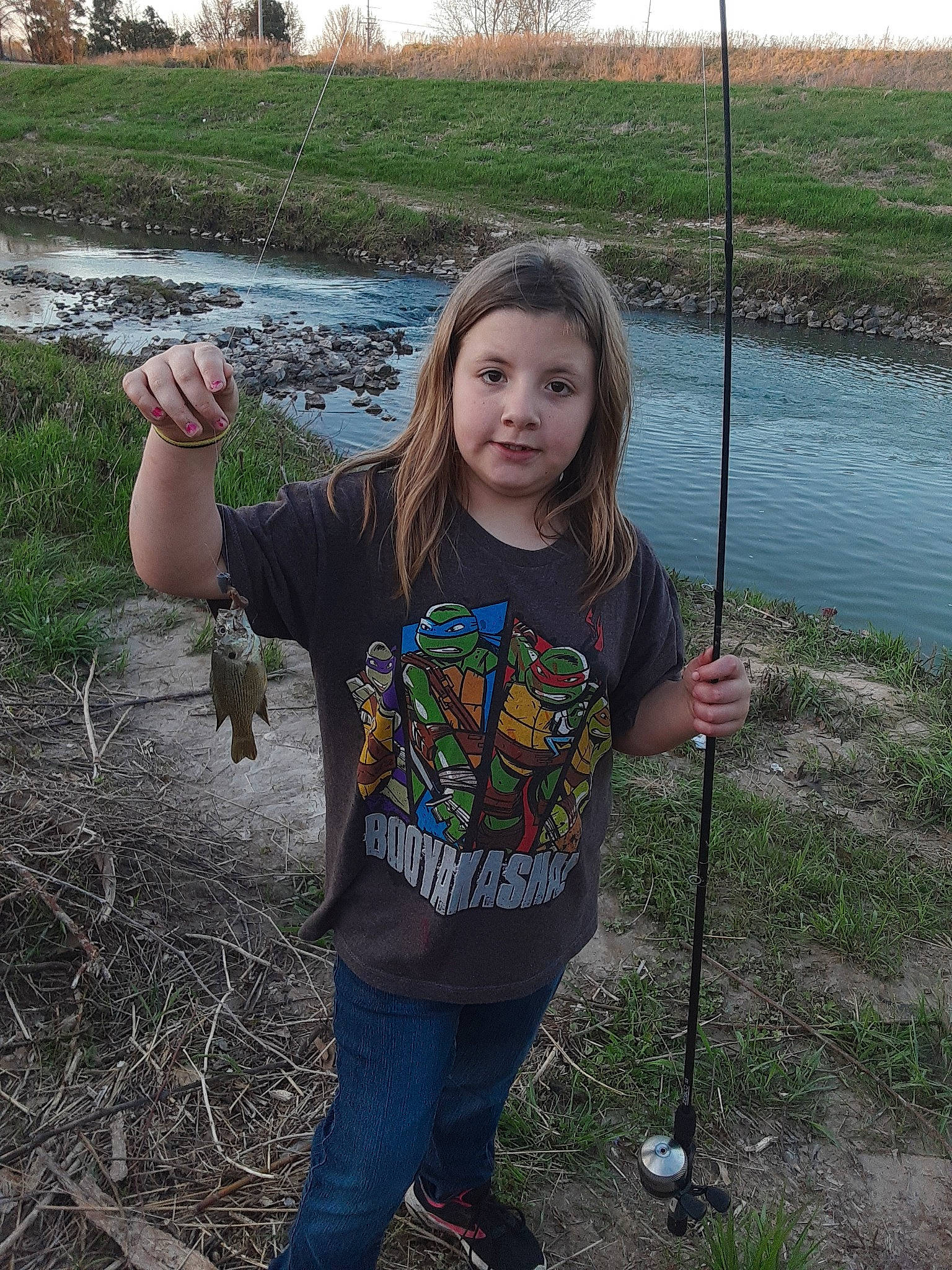 Catherine joined the competition — help win amazing prizes! botany, child, fun, grass, grass_family, happy, jeans, lake, nature, pattern, people_in_nature, person, plant, recreation, sleeve, smile, soil, t_shirt, toddler, vacation