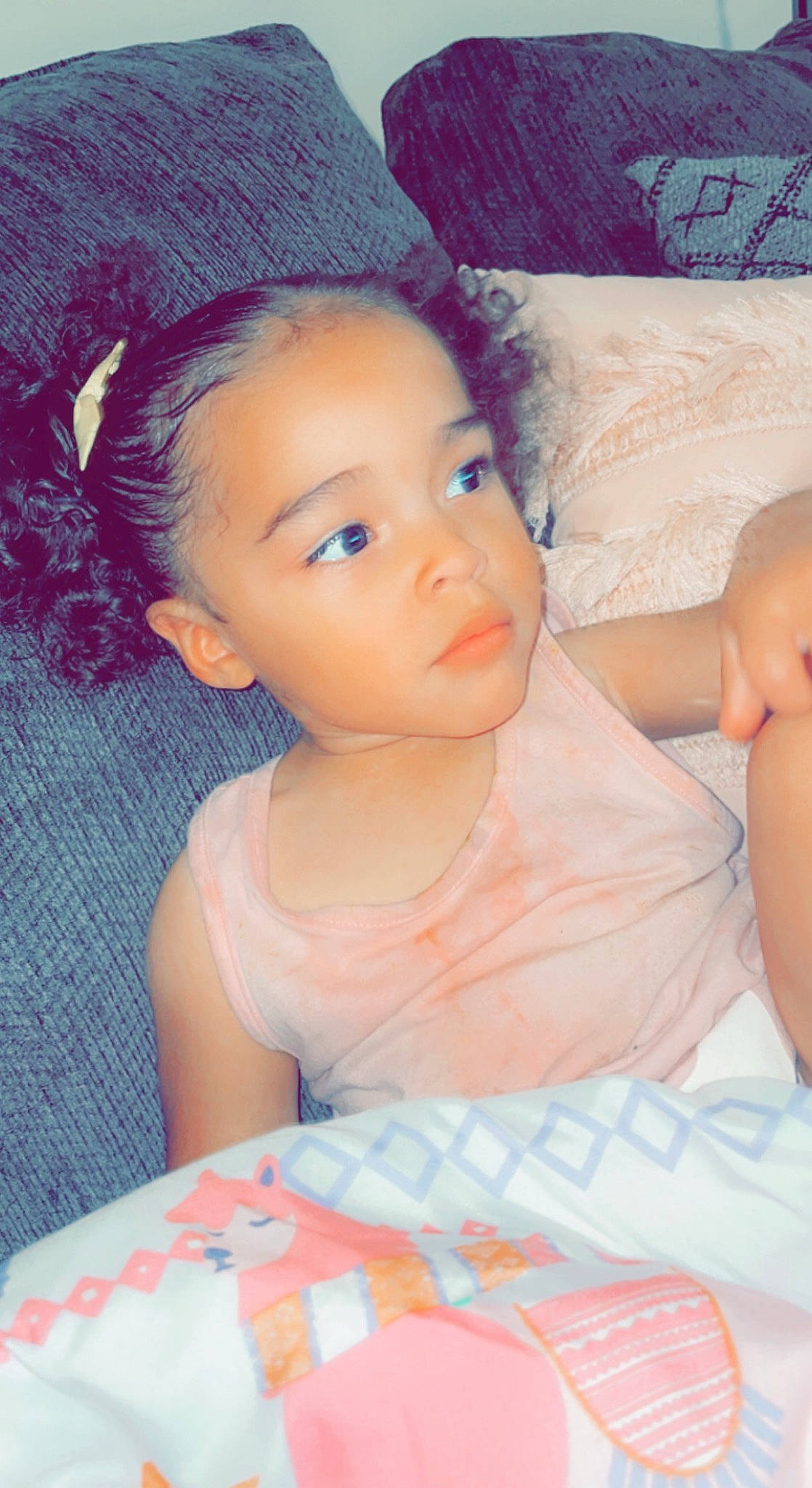 Armani is registered to the contest to win money with this photo: baby_toddler_clothing, blue, cheek, child, chin, comfort, eye, eyebrow, eyelash, flash_photography, happy, iris, linens, lip, mouth, nose, person, pink, skin, textile