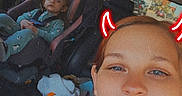 Kristie joined the competition — help win amazing prizes! car_interior, car_seat, casual, child, child_in_car_seat, daylight, devil_horns, digital_filter, hoodie, outside_view, portrait, relaxed, road, seat, seatbelt, selfie, smile, toddler, window, woman