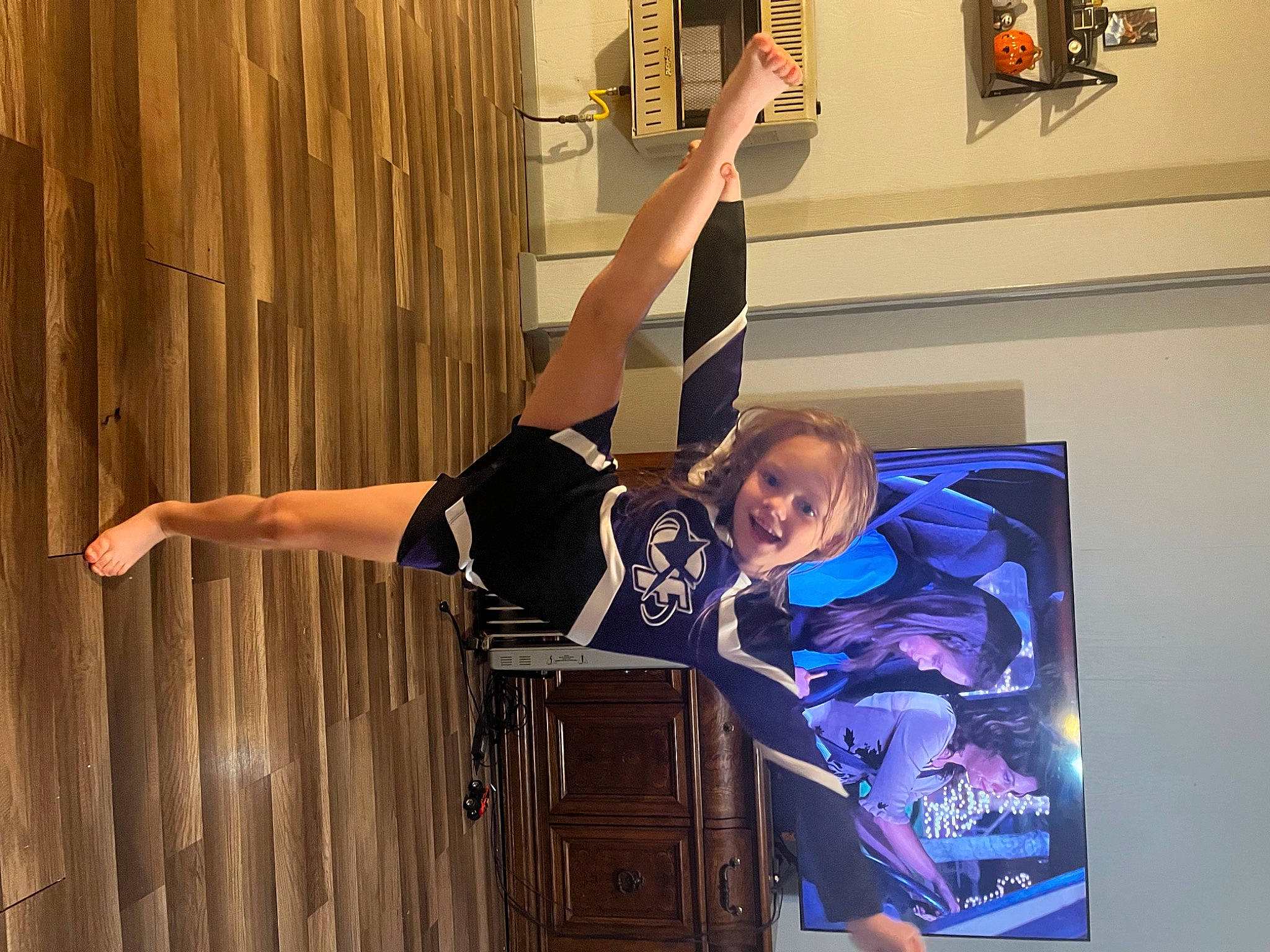 Addison joined the competition — help win amazing prizes! balance, elbow, electric_blue, entertainment, event, fun, happy, human_leg, joy, knee, performing_arts, person, physical_fitness, picture_frame, room, shorts, sports, sports_uniform, sportswear, thigh