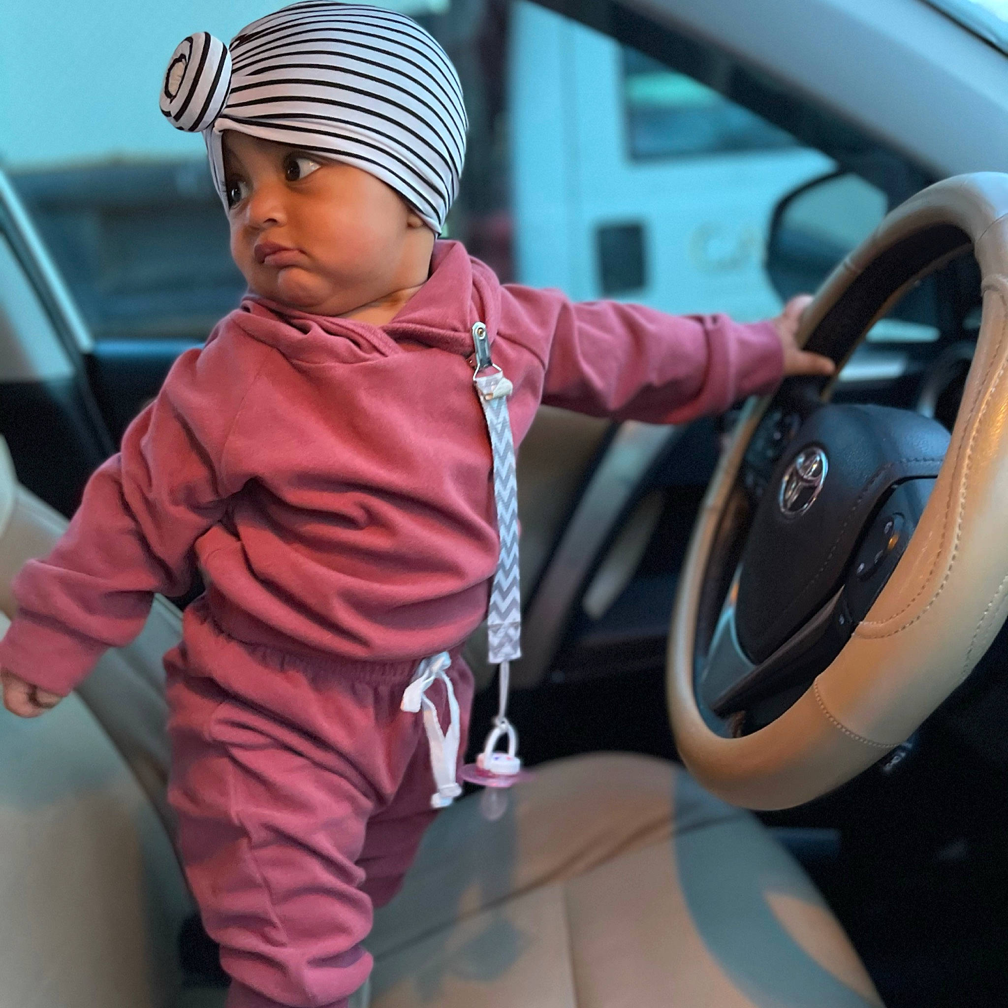 Penny joined the competition — help win amazing prizes! auto_part, automotive_design, automotive_exterior, automotive_lighting, automotive_mirror, automotive_wheel_system, baby_toddler_clothing, cap, car, car_seat, hat, headwear, motor_vehicle, person, personal_luxury_car, rear_view_mirror, steering_wheel, street_fashion, toddler, vehicle
