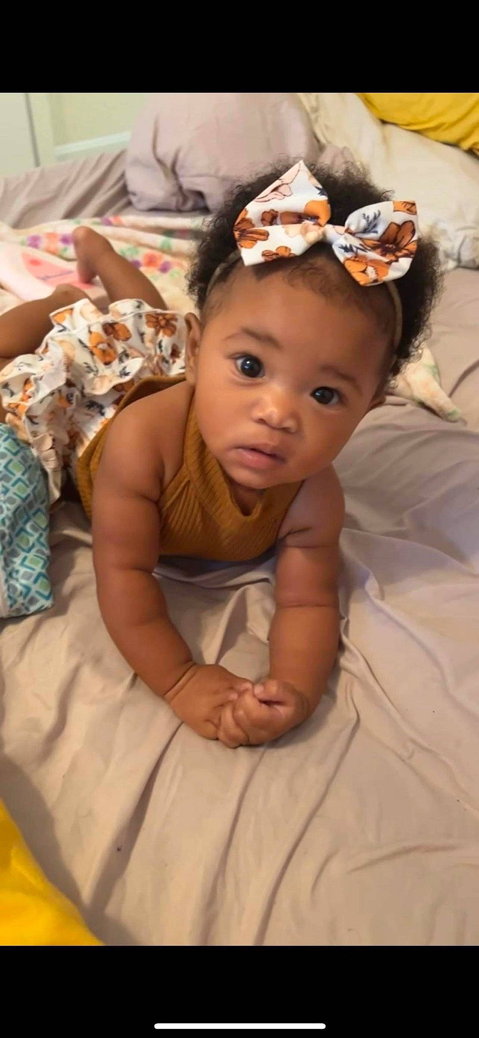 Jamia is registered to the contest to win money with this photo: baby, baby_toddler_clothing, child, dress, event, eye, fashion_accessory, flash_photography, fun, hair_accessory, happy, hat, head, headband, headpiece, jewellery, linens, person, portrait_photography, sitting