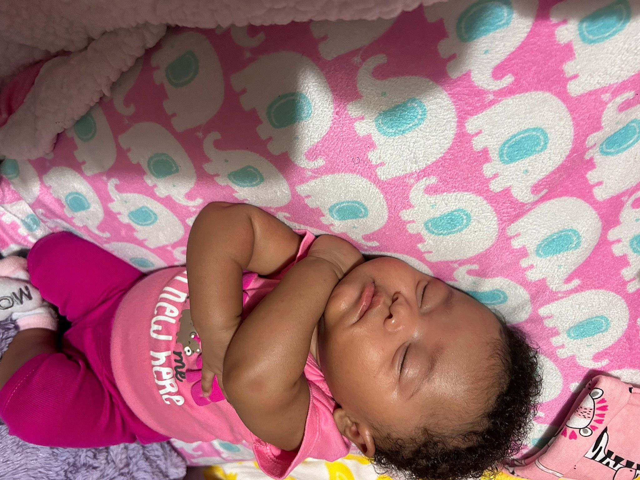 Jamia is registered to the contest to win money with this photo: baby, baby_toddler_clothing, bedtime, cheek, child, comfort, design, fun, happy, linens, magenta, nap, pattern, person, pink, room, skin, sleep, textile, thigh