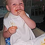 toddler, child, messy, food, eating, high_chair, bib, smiling, happy, dining_room, plate, table, indoor, person, clothing, hair, face, hand, seat, meal