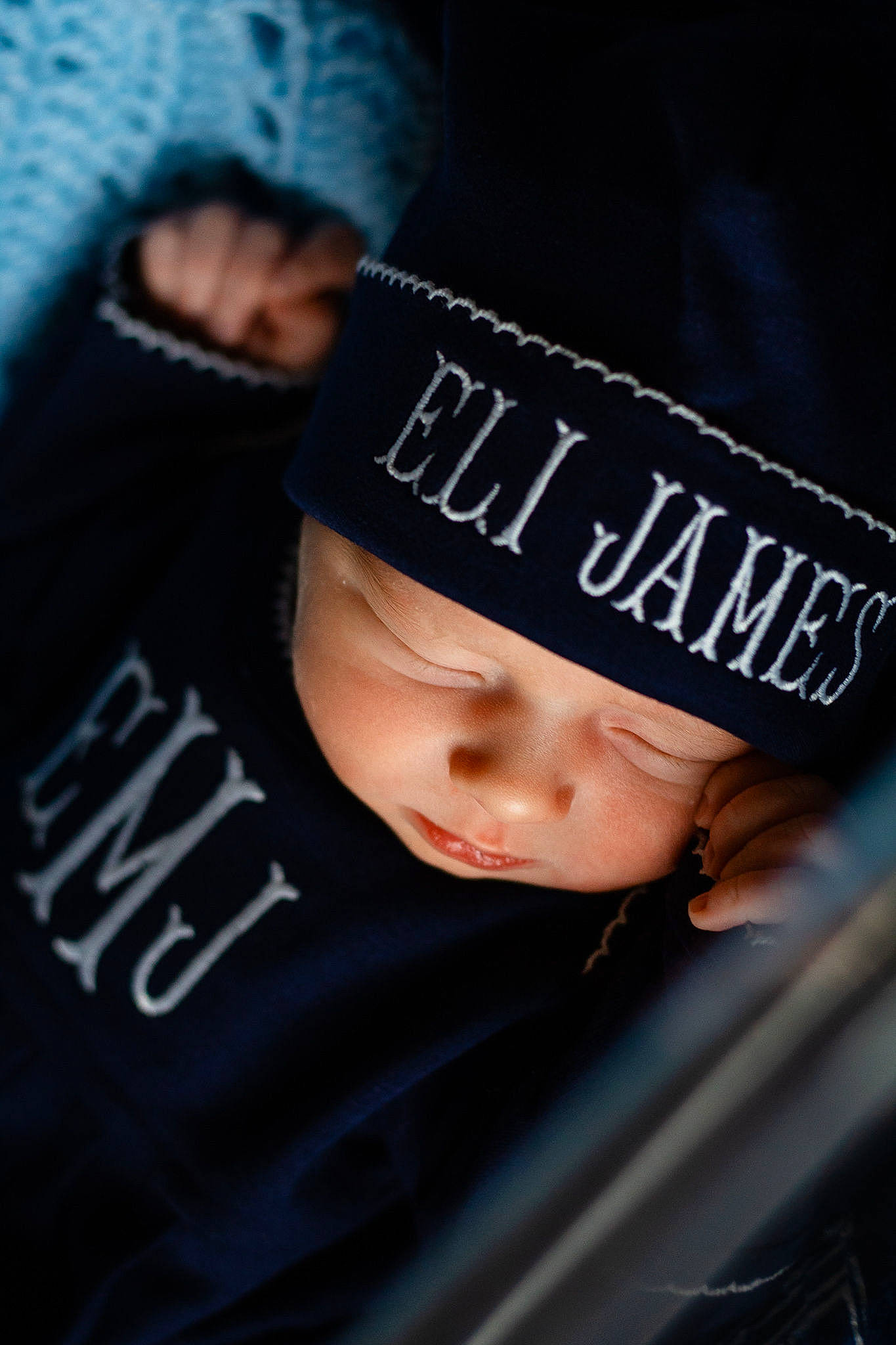 Eli joined the competition — help win amazing prizes! baby, beanie, cap, child, cool, fashion_accessory, flash_photography, font, happy, hat, headwear, person, portrait_photography, sitting, sleeve, t_shirt, toddler