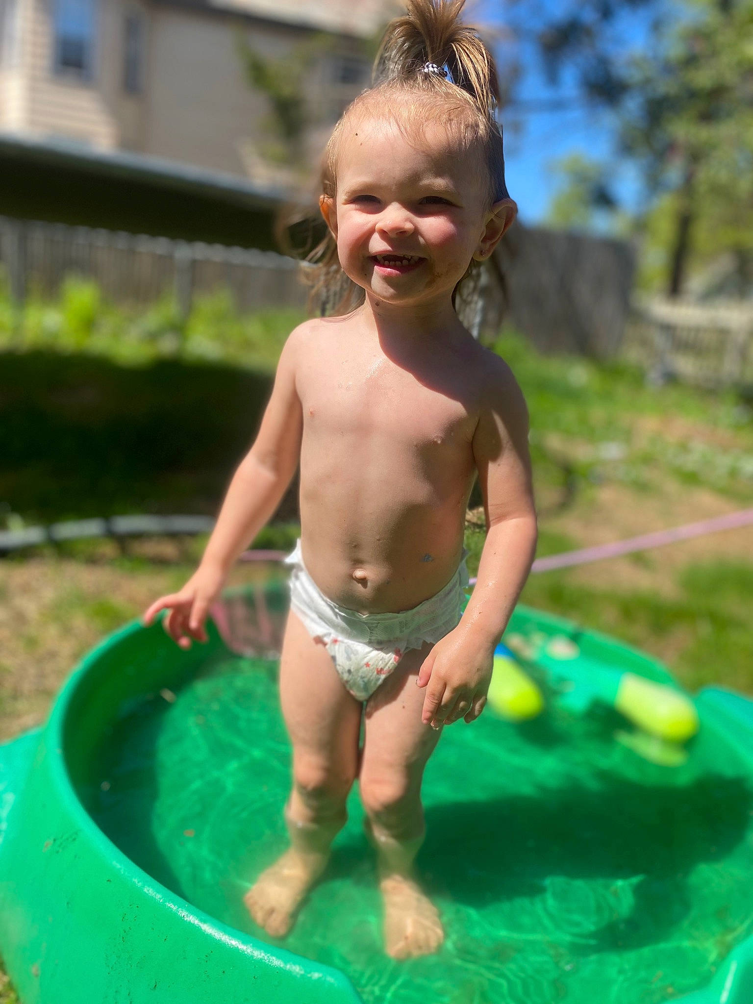 Adalynn is registered to the contest to win money with this photo: barechested, barefoot, bathing, chest, child, face, fun, games, grass, happy, head, headband, joy, leisure, person, play, recreation, smile, swimwear, toddler