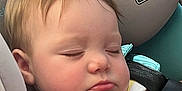 Astrid joined the competition — help win amazing prizes! accessories, baby, belt, blanket, car, car_interior, carseat, cushion, electronics, face, frown, head, headrest, homedecor, person, photography, portrait, sleeping, transportation, vehicle