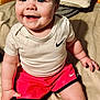 Astrid joined the competition — help win amazing prizes! baby, bodypart, clothing, couch, cushion, face, finger, furniture, happy, head, homedecor, indoors, laughing, person, photography, portrait, shorts, sitting, smile, t_shirt
