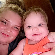 Astrid is registered to the contest to win money with this photo: accessories, baby, bodypart, clothing, face, finger, hand, happy, head, indoors, jewelry, laughing, mouth, person, photography, portrait, selfie, smile, t_shirt, teeth