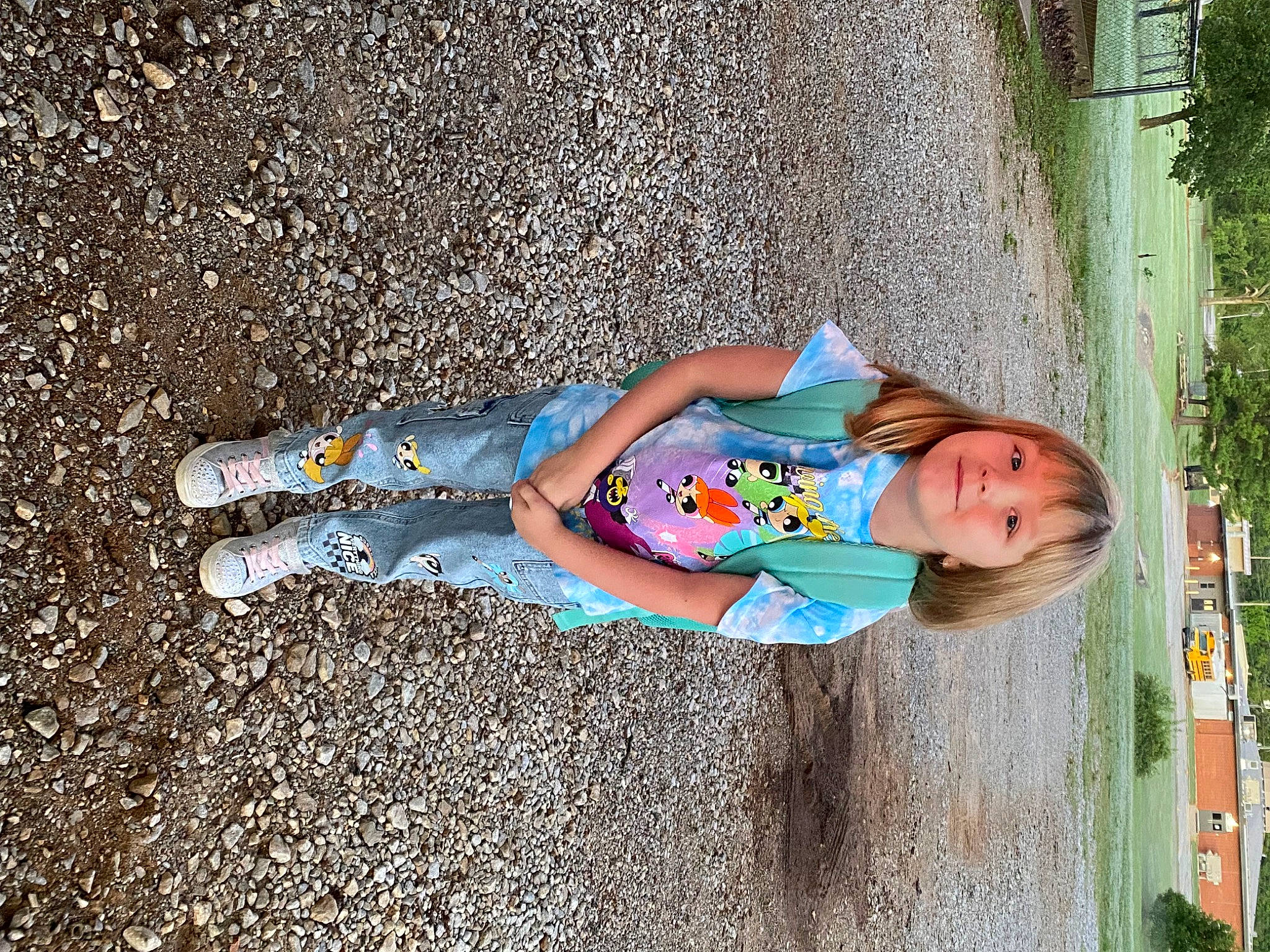 Kynlee is registered to the contest to win money with this photo: asphalt, child, concrete, electric_blue, fun, grass, happy, human_leg, joy, leisure, people_in_nature, person, plant, play, recreation, road_surface, shadow, sidewalk, sitting, tints_and_shades