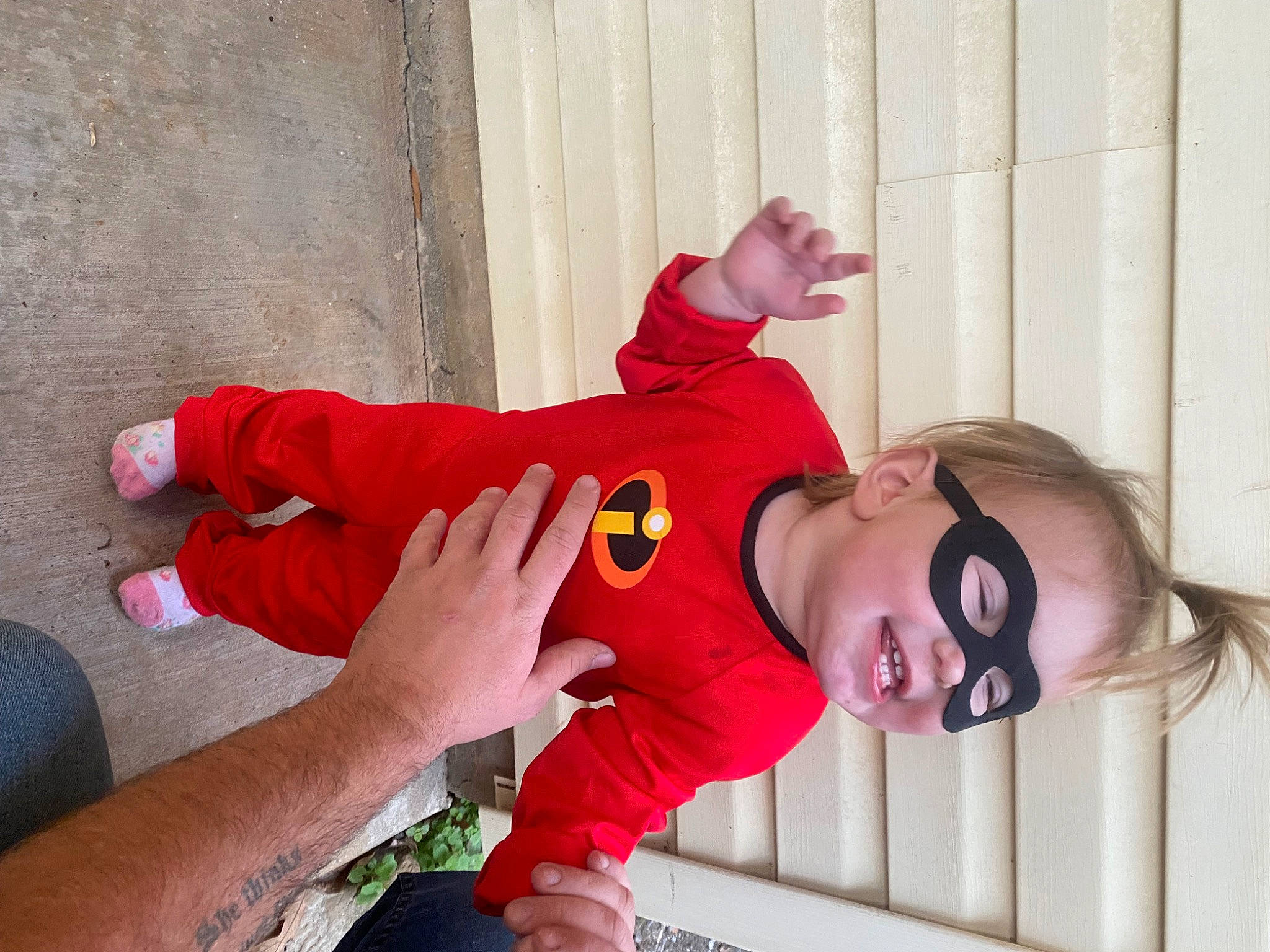 Rylee is registered to the contest to win money with this photo: carmine, child, costume, elbow, fun, happy, human_leg, joint, knee, leisure, magenta, person, pink, room, sleeve, sportswear, t_shirt, thigh, toddler, vacation