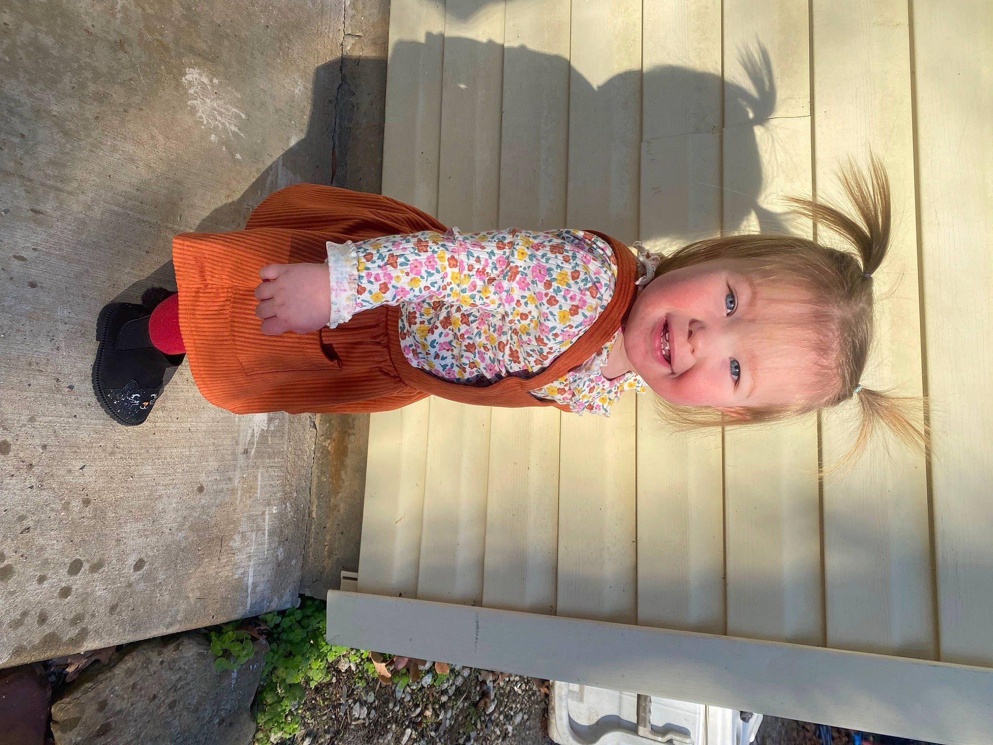 Rylee is registered to the contest to win money with this photo: baby, baby_laughing, baby_products, baby_safety, baby_toddler_clothing, child, fun, happy, human_leg, joy, pattern, person, smile, thigh, toddler, wood