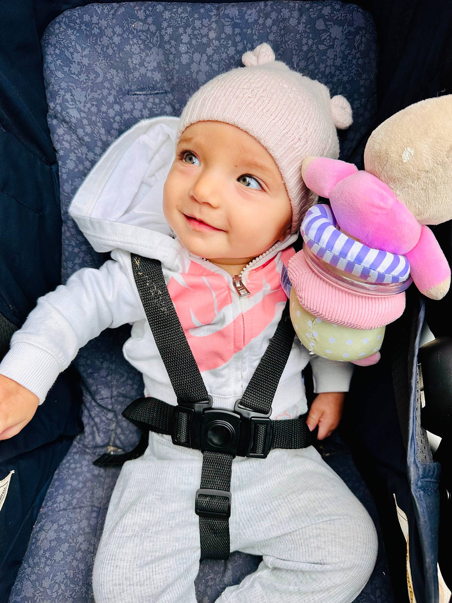 Astrid joined the competition — help win amazing prizes! baby, baby_carriage, baby_products, baby_toddler_clothing, cap, cheek, child, comfort, fashion_accessory, gesture, glove, happy, headwear, human_body, joy, knit_cap, person, pink, sitting, sleeve