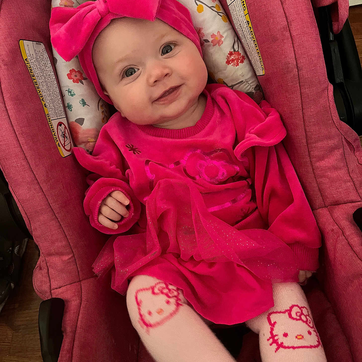 Zoe is registered to the contest to win money with this photo: baby, bodypart, chair, clothing, couch, cushion, face, finger, furniture, glove, hand, hat, head, homedecor, person, photography, portrait, purple, skin, tattoo