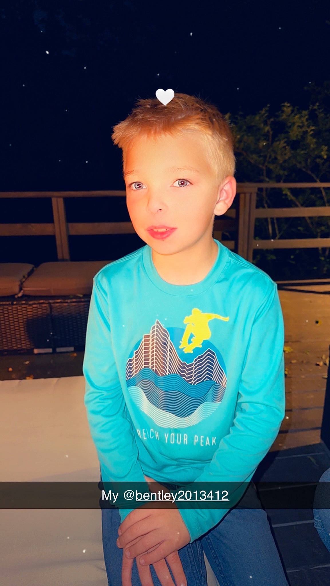 Bently is registered to the contest to win money with this photo: azure, baby_toddler_clothing, child, clothing, cool, electric_blue, eyewear, flash_photography, fun, happy, iris, leisure, logo, neck, person, play, sleeve, standing, t_shirt, toddler