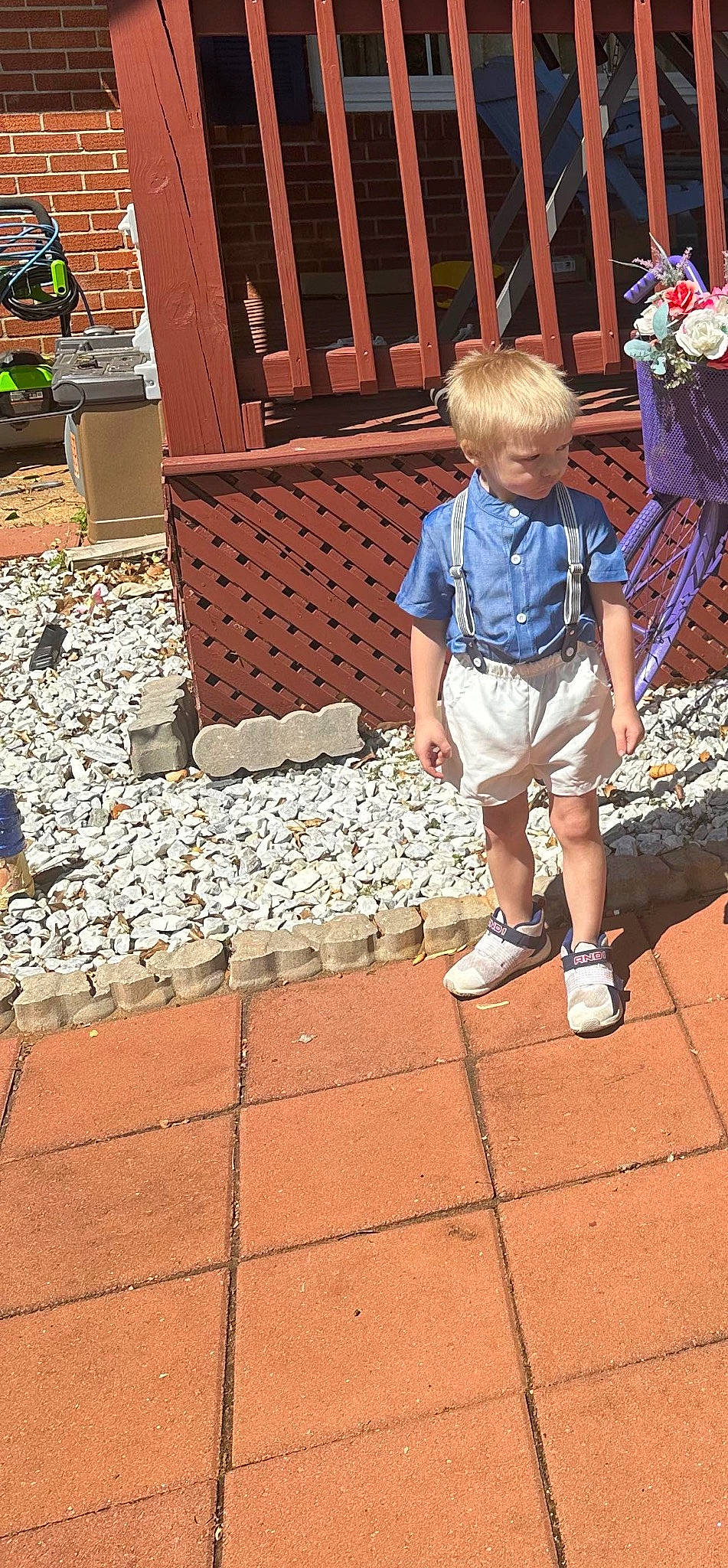 Carter is registered to the contest to win money with this photo: brick, brickwork, child, city, cobblestone, flagstone, flooring, fun, human_leg, landscape, leisure, person, road_surface, shorts, sidewalk, soil, summer, toddler, travel, vacation