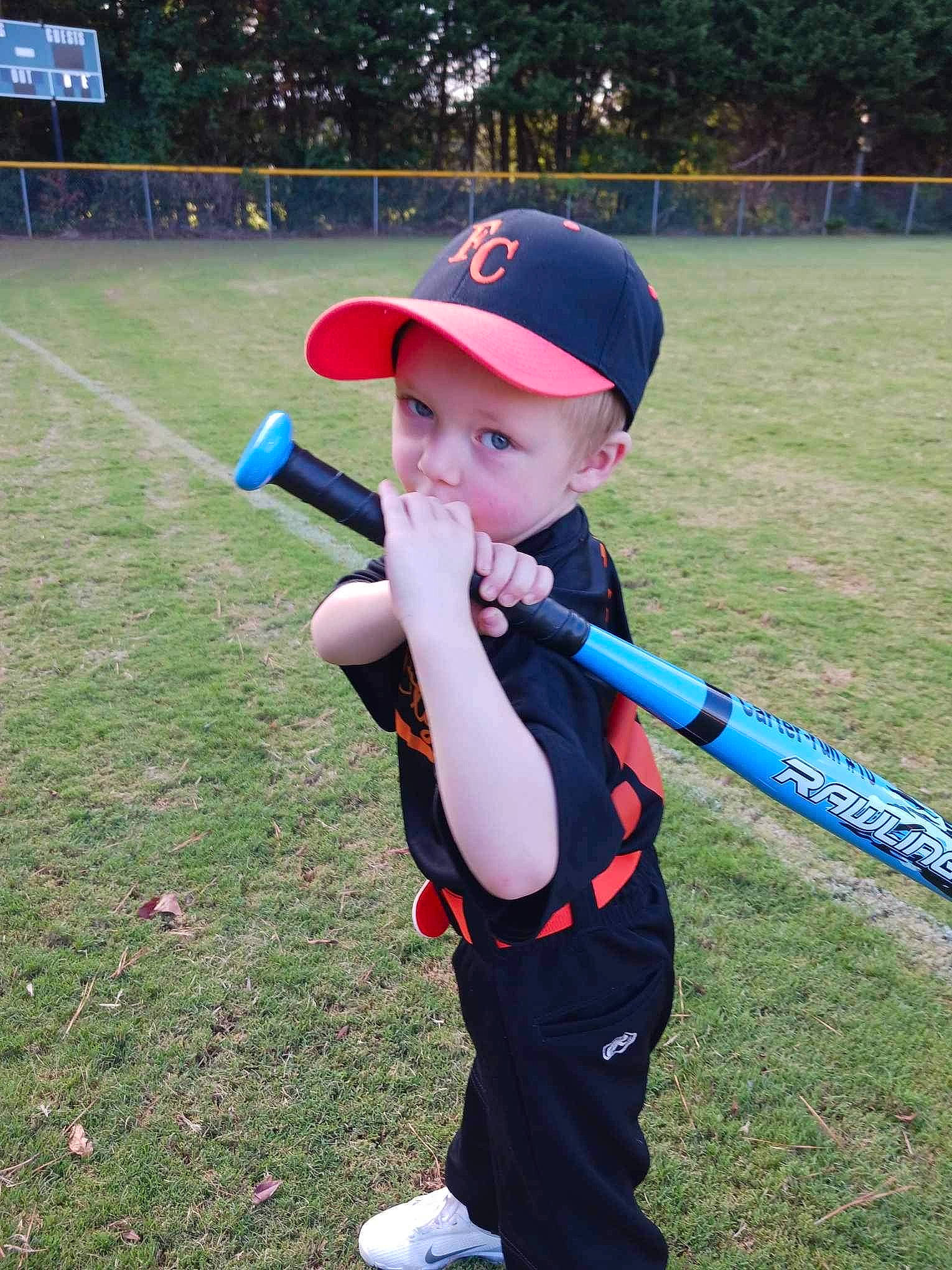 Carter joined the competition — help win amazing prizes! ball_game, baseball, baseball_bat, baseball_cap, baseball_equipment, baseball_player, bat_and_ball_games, boats_and_boating_equipment_and_supplies, cap, electric_blue, fun, grass, headwear, person, player, recreation, softball_bat, sports, t_shirt, team_sport