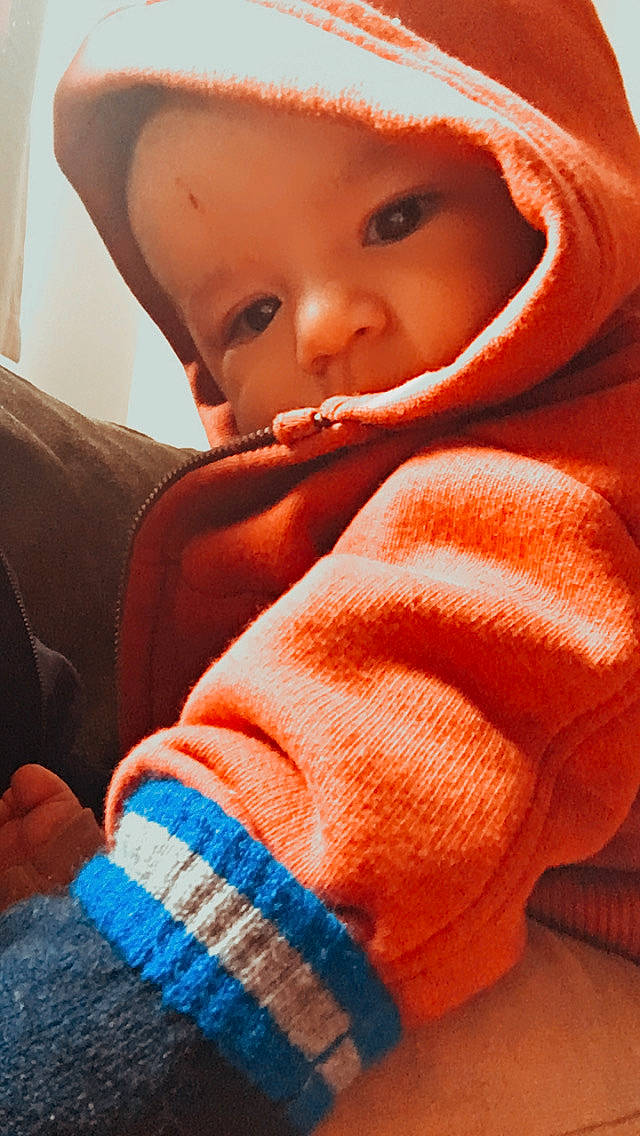 Enoch joined the competition — help win amazing prizes! baby, baby_toddler_clothing, beauty, cheek, comfort, eye, eyebrow, finger, head, headwear, human, joint, lip, nose, orange, outerwear, person, red, skin, sleeve