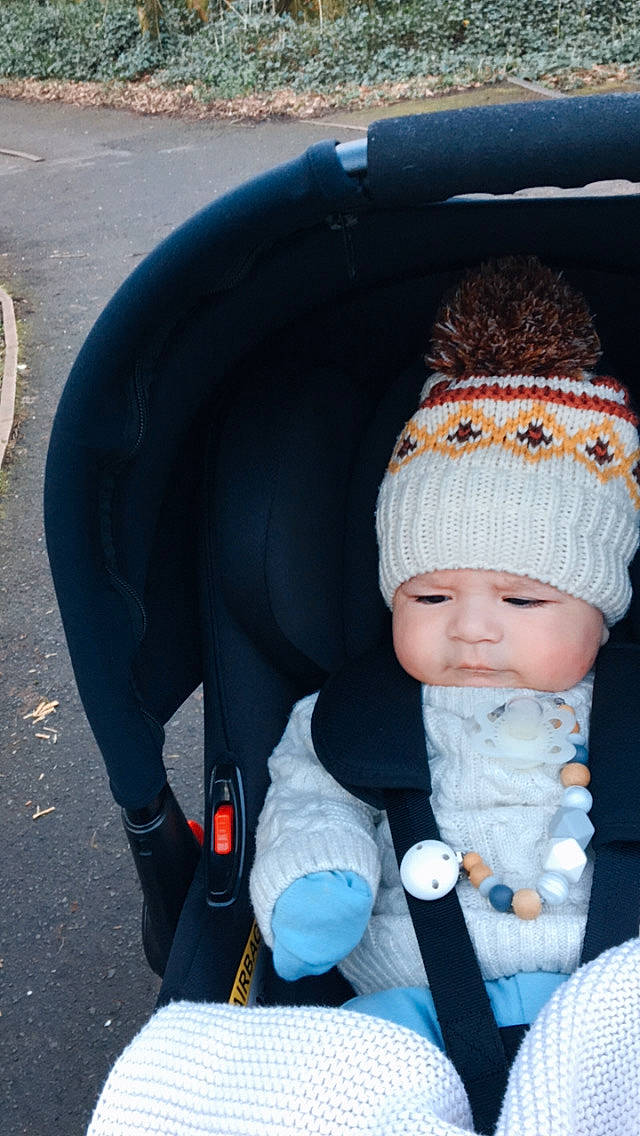 Enoch joined the competition — help win amazing prizes! asphalt, automotive_exterior, automotive_tire, baby, baby_carriage, baby_products, baby_toddler_clothing, beanie, cap, car_seat, child, electric_blue, fashion_accessory, fun, headwear, knit_cap, person, sitting, toddler, tree