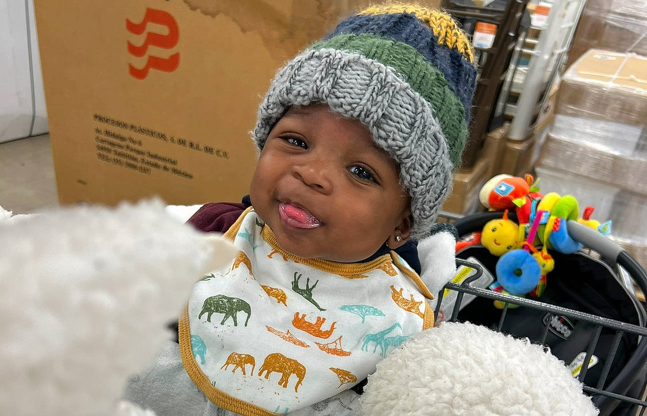 Ocean joined the competition — help win amazing prizes! cap, child, event, eye, fashion_accessory, fun, fur, happy, headgear, headwear, human, knit_cap, organ, people, person, room, snapshot, stuffed_toy, textile, toddler