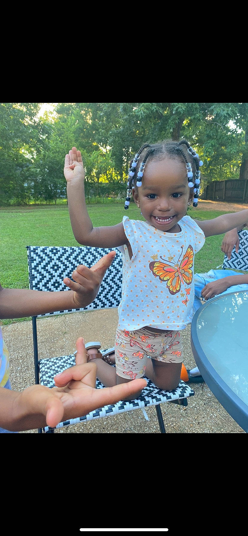 Paisley Elise joined the competition — help win amazing prizes! baby_toddler_clothing, child, cool, fun, grass, happy, joy, lawn, leaf, leisure, people_in_nature, person, plant, recreation, sandal, shorts, sitting, smile, summer, thigh