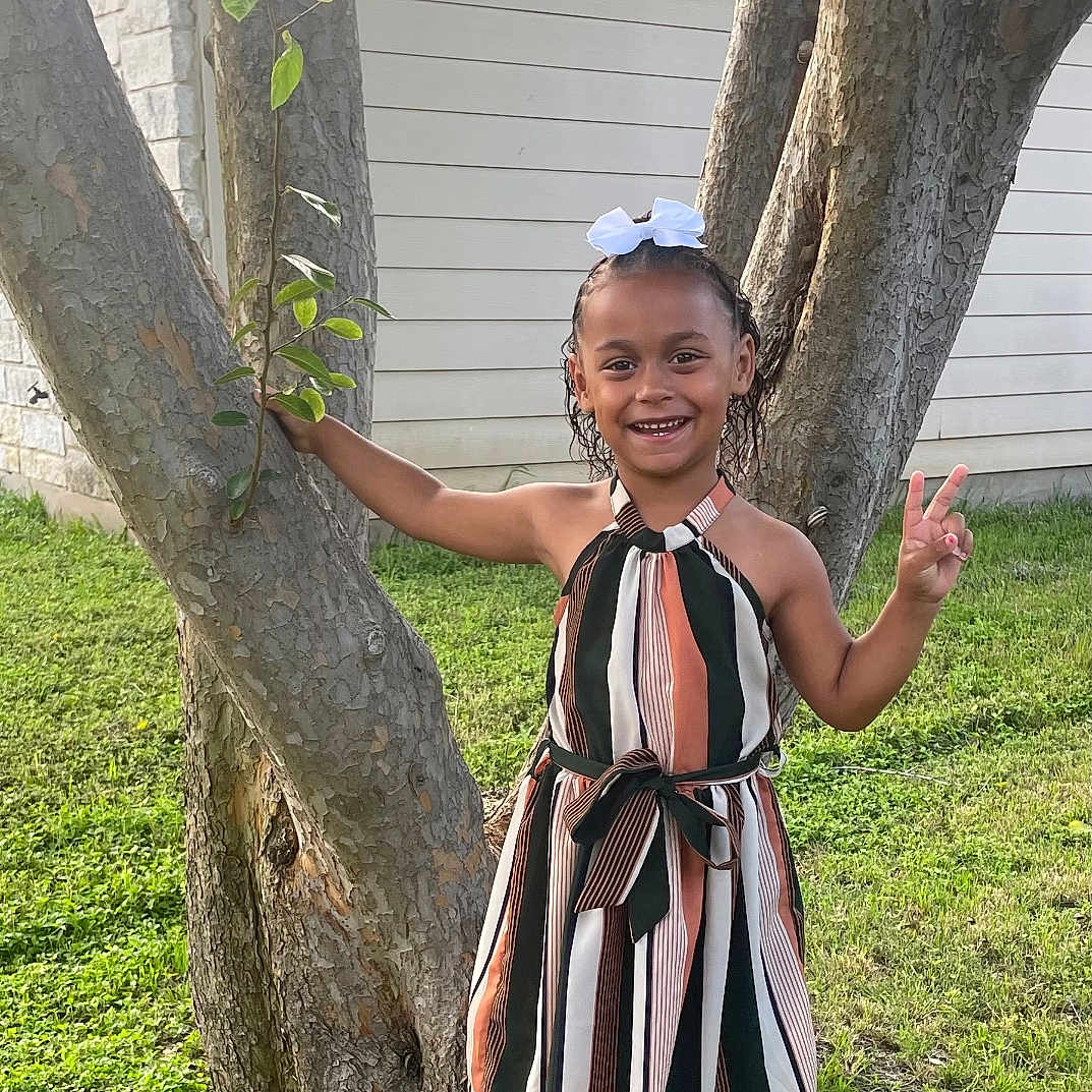 Lila joined the competition — help win amazing prizes! backyard, child, clothing, costume, dress, face, grass, head, nature, outdoors, park, person, photography, plant, portrait, skirt, summer, tree, vegetation, yard