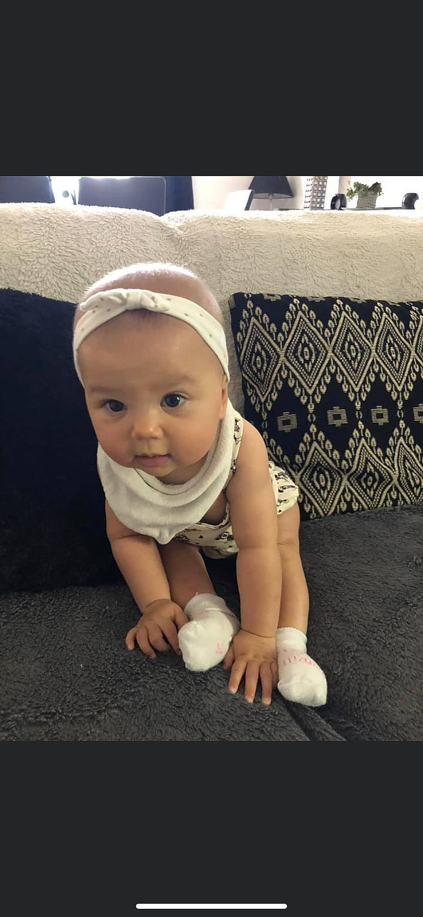 Diana participe au concours pour gagner de l'argent avec cette photo : baby, baby_products, baby_toddler_clothing, cap, cheek, child, comfort, couch, flash_photography, flooring, foot, grass, happy, human_leg, linens, person, skin, sleeve, t_shirt, toddler