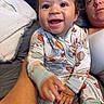 Kiyan Alan is registered to the contest to win money with this photo: baby, infant, child, adult, parent, smiling, happy, portrait, selfie, indoor, bed, bedding, pajamas, clothing, cuddling, family, home, close_up, human, playful