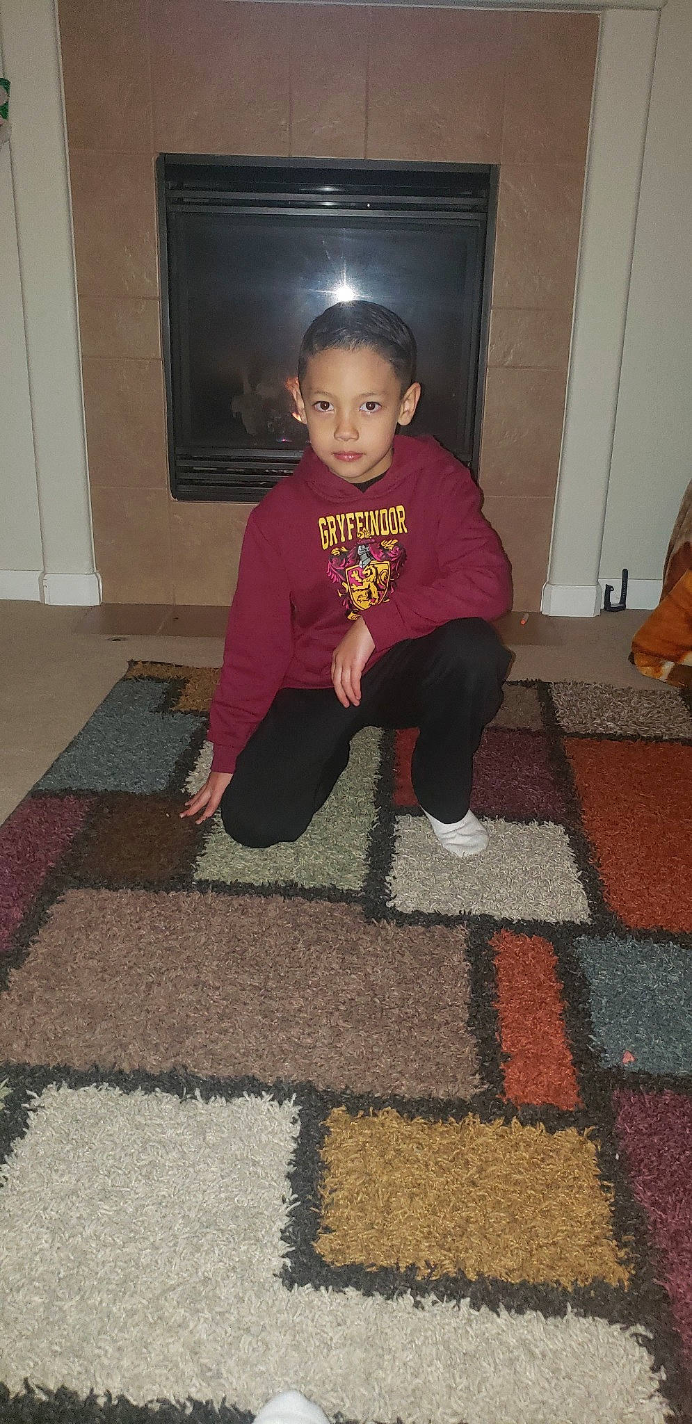 Justus is registered to the contest to win money with this photo: carpet, child, floor, flooring, person, sitting, toddler