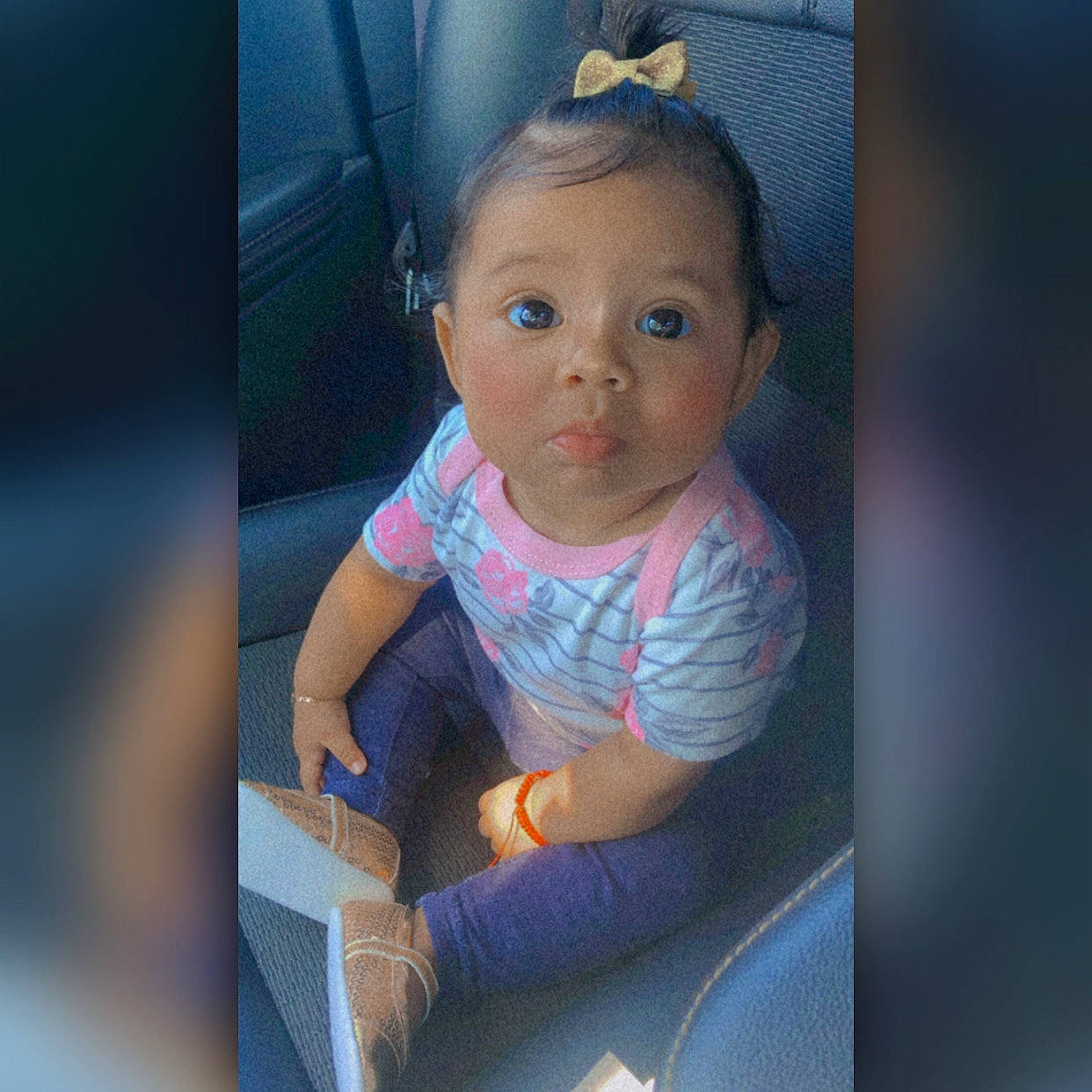 Adelyn is registered to the contest to win money with this photo: baby, baby_products, baby_toddler_clothing, cheek, child, electric_blue, eyebrow, eyelash, facial_expression, fashion_accessory, flash_photography, fun, iris, nose, person, purple, sitting, skin, sleeve, t_shirt