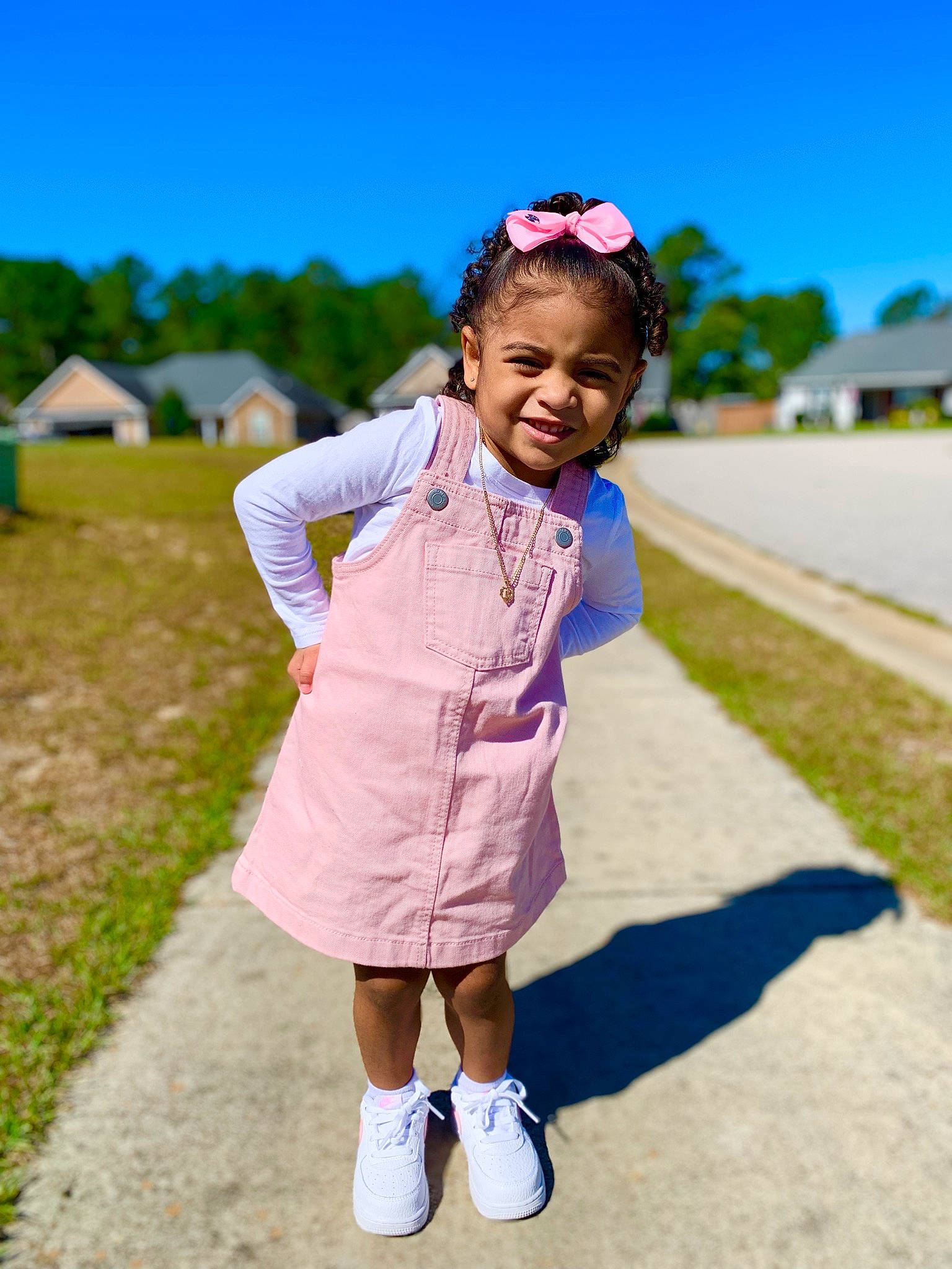 Emalia is registered to the contest to win money with this photo: child, electric_blue, fun, gesture, grass, grassland, happy, jewellery, leisure, magenta, person, recreation, sky, sleeve, standing, street_fashion, toddler, travel, tree, uniform