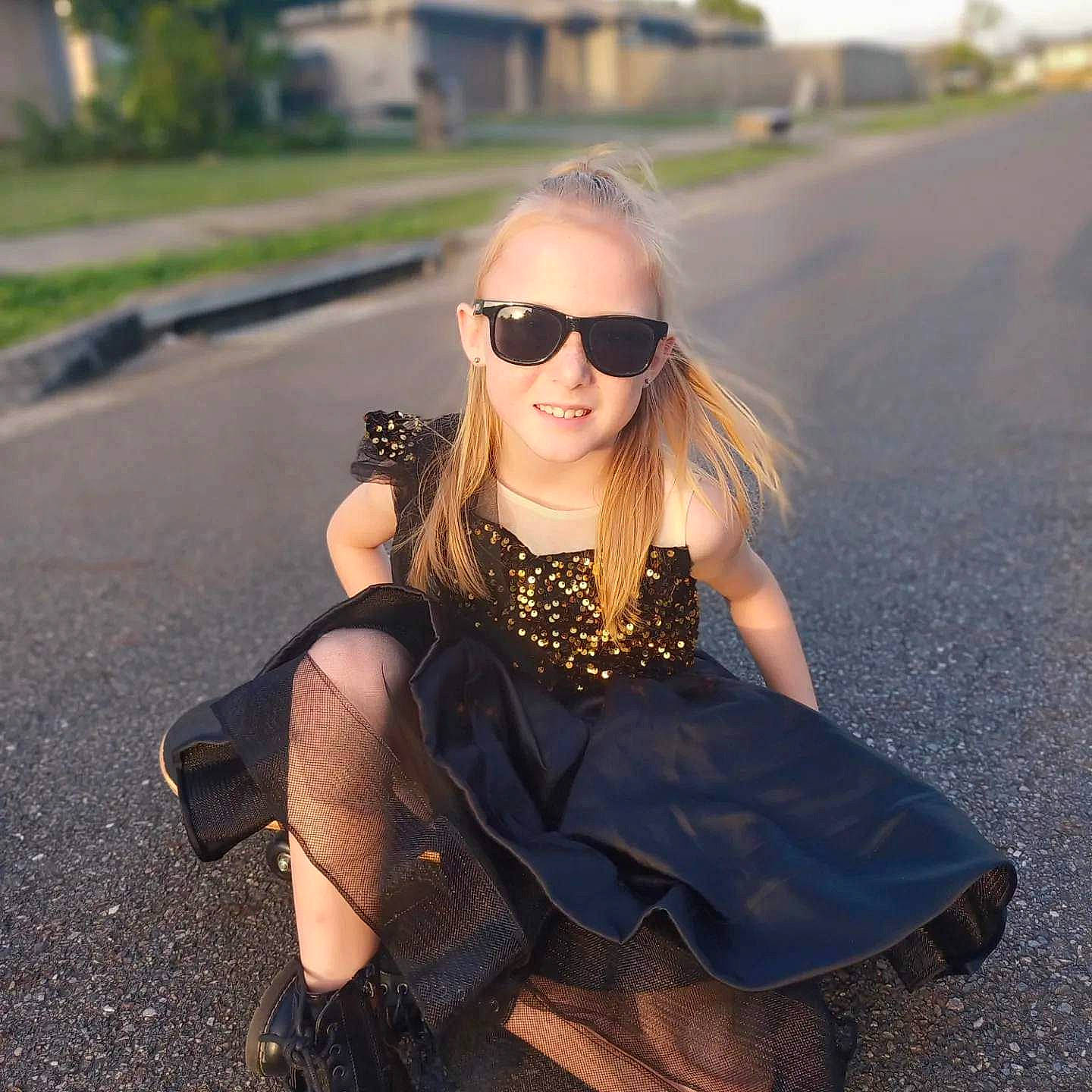 Destiny is registered to the contest to win money with this photo: dress, eyewear, flash_photography, glasses, goggles, grass, hairstyle, happy, joy, leg, neck, person, plant, shoe, shoulder, smile, standing, sunglasses, sunlight, textile