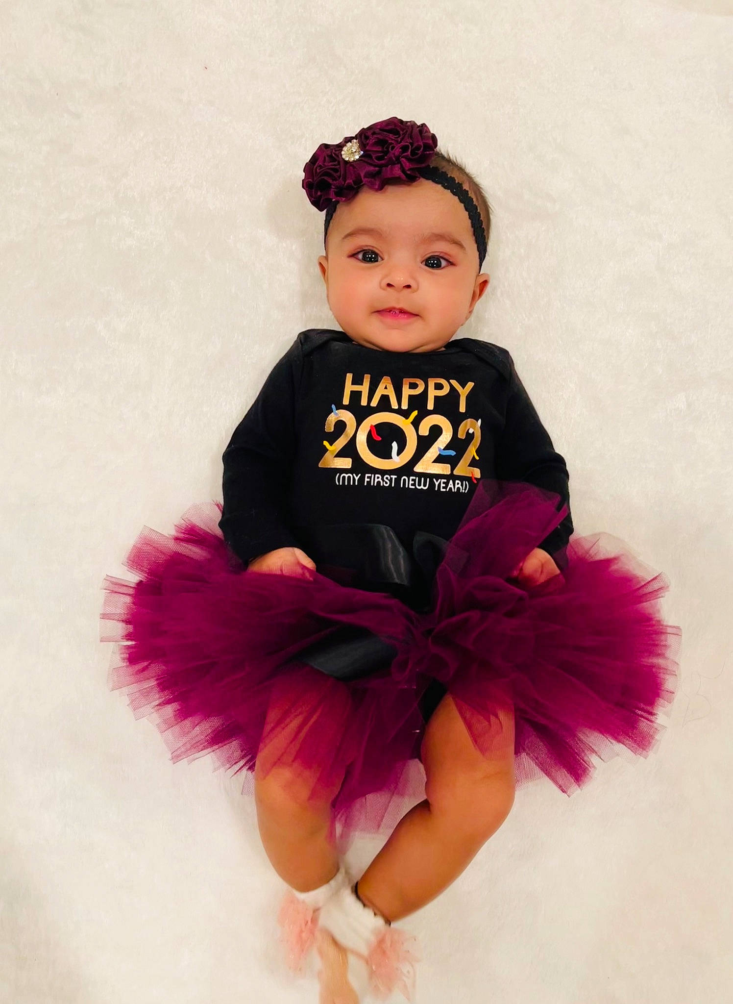 Sitara joined the competition — help win amazing prizes! baby, baby_toddler_clothing, brown_hair, costume_hat, day_dress, doll, fashion_accessory, fashion_design, hair_accessory, hat, headpiece, headwear, jewellery, magenta, person, petal, pink, purple, sleeve, textile